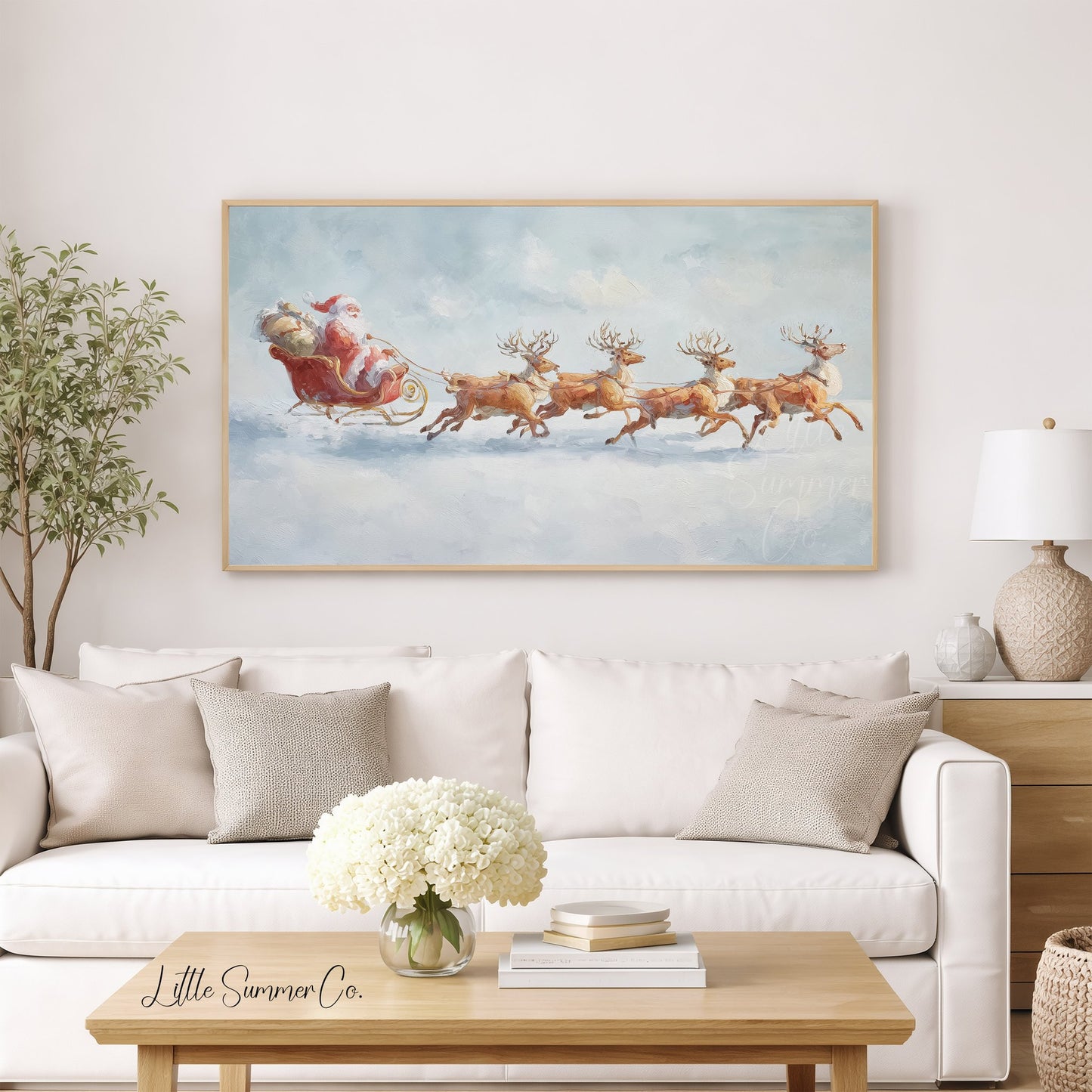 Santa's Sleigh and Reindeer Frame TV Art displayed on a TV