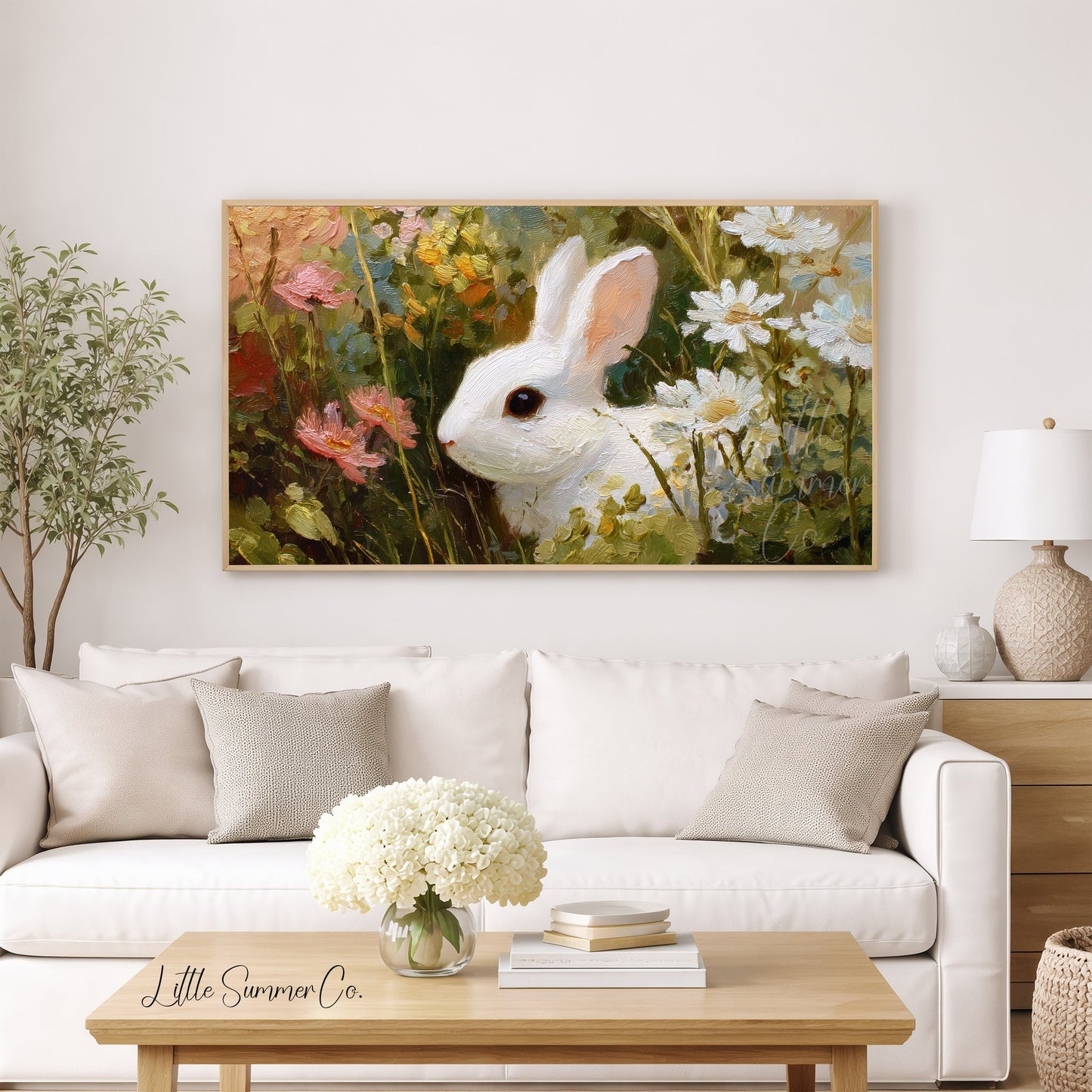 White Bunny in Wildflowers Frame TV Art displayed on a TV