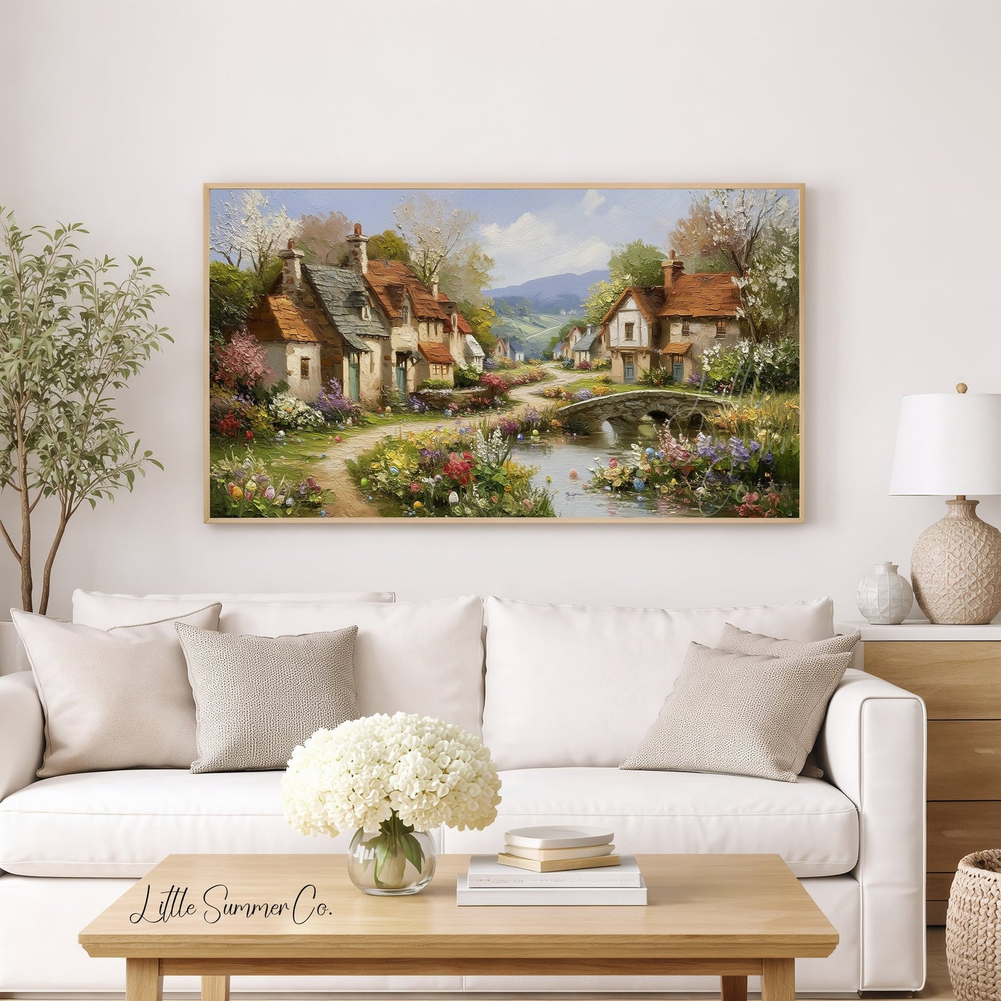 Cottage Village in Spring Frame TV Art displayed on a TV