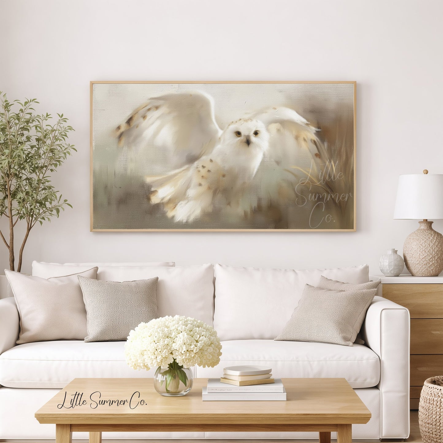 Snowy Owl in Flight Frame TV Art displayed on a TV