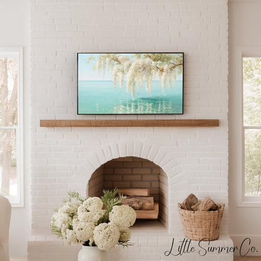White Wisteria Over Coastal Water Frame TV Art displayed on a TV
