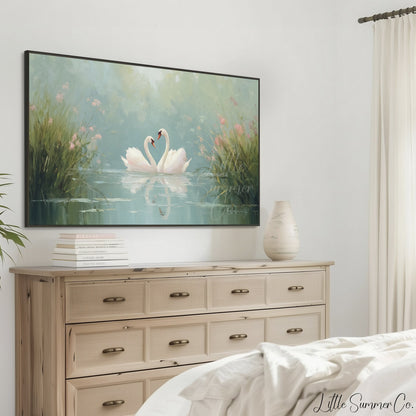 Swans Among Pink Wildflowers Frame TV Art displayed on a TV