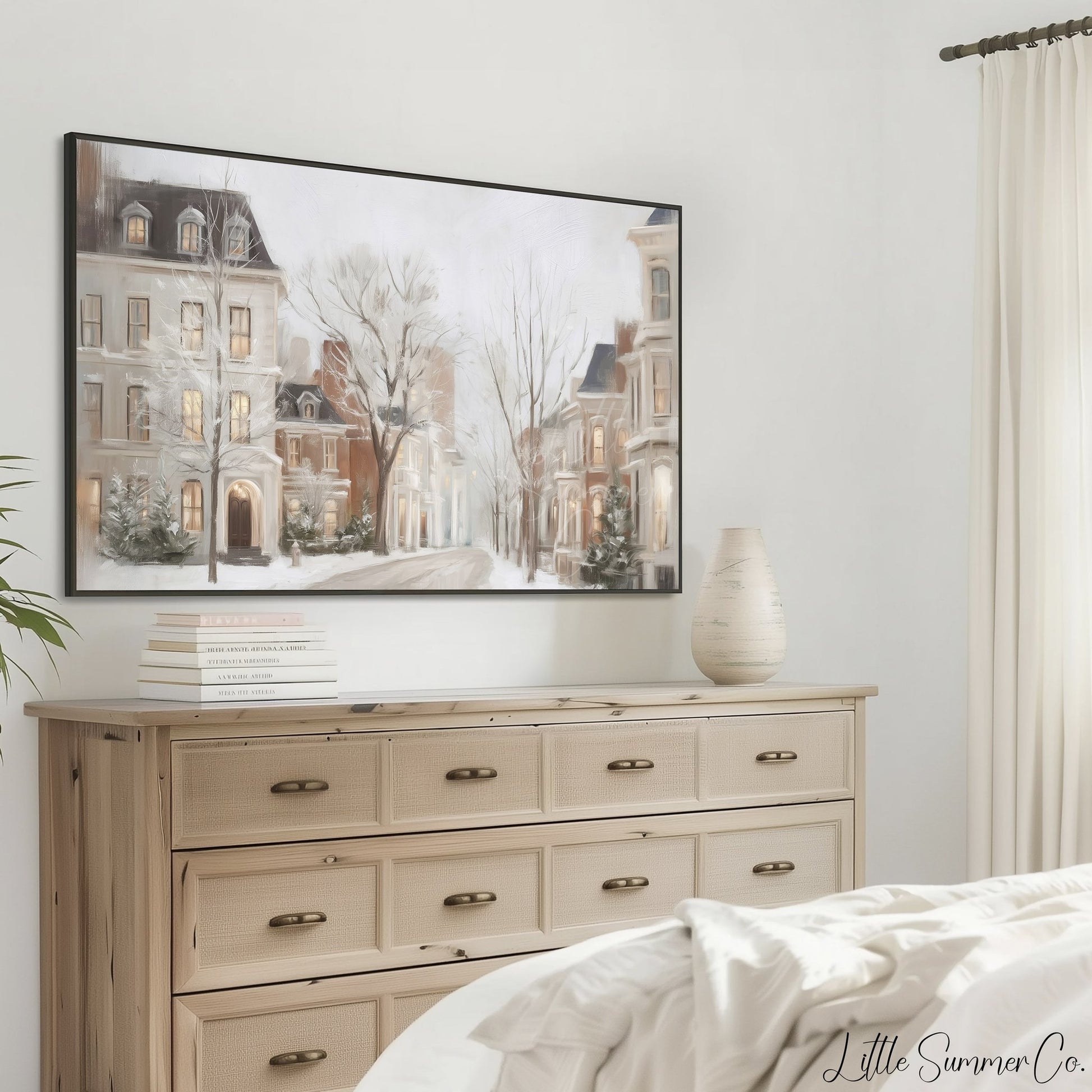 Snowy Townhouses Street Frame TV Art displayed on a TV
