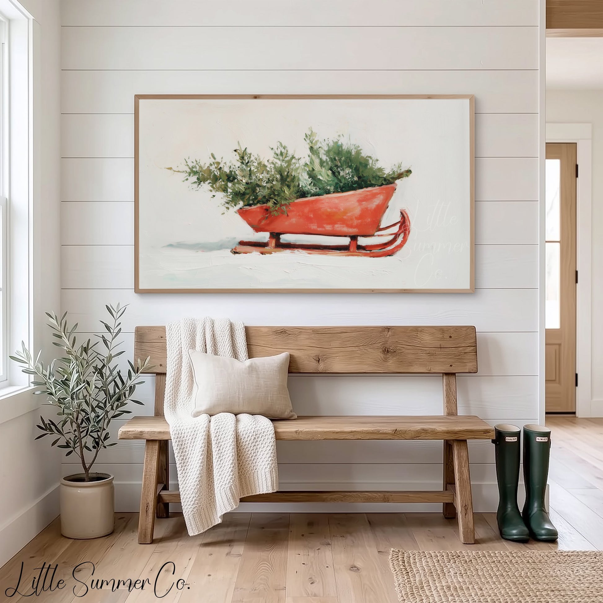 Holiday Sleigh Greenery Frame TV Art displayed on a TV