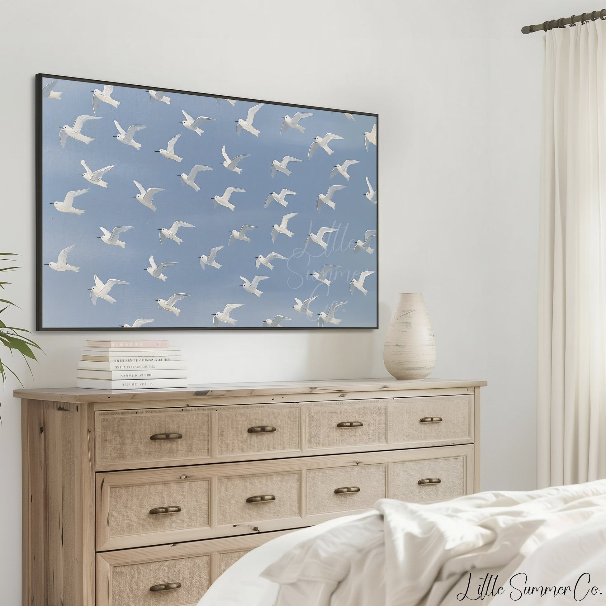 Flying White Birds Frame TV Art displayed on a TV