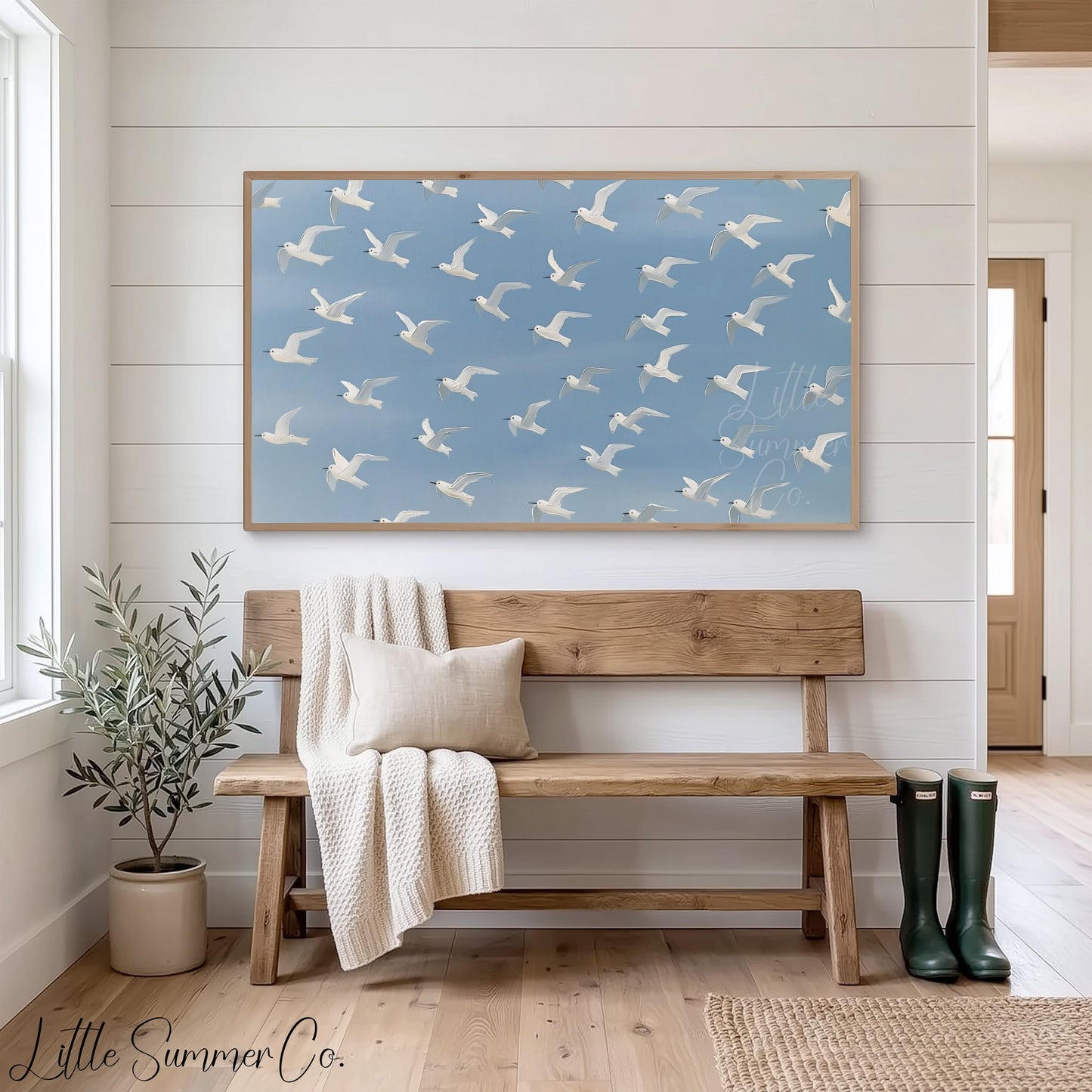 Flying White Birds Frame TV Art displayed on a TV