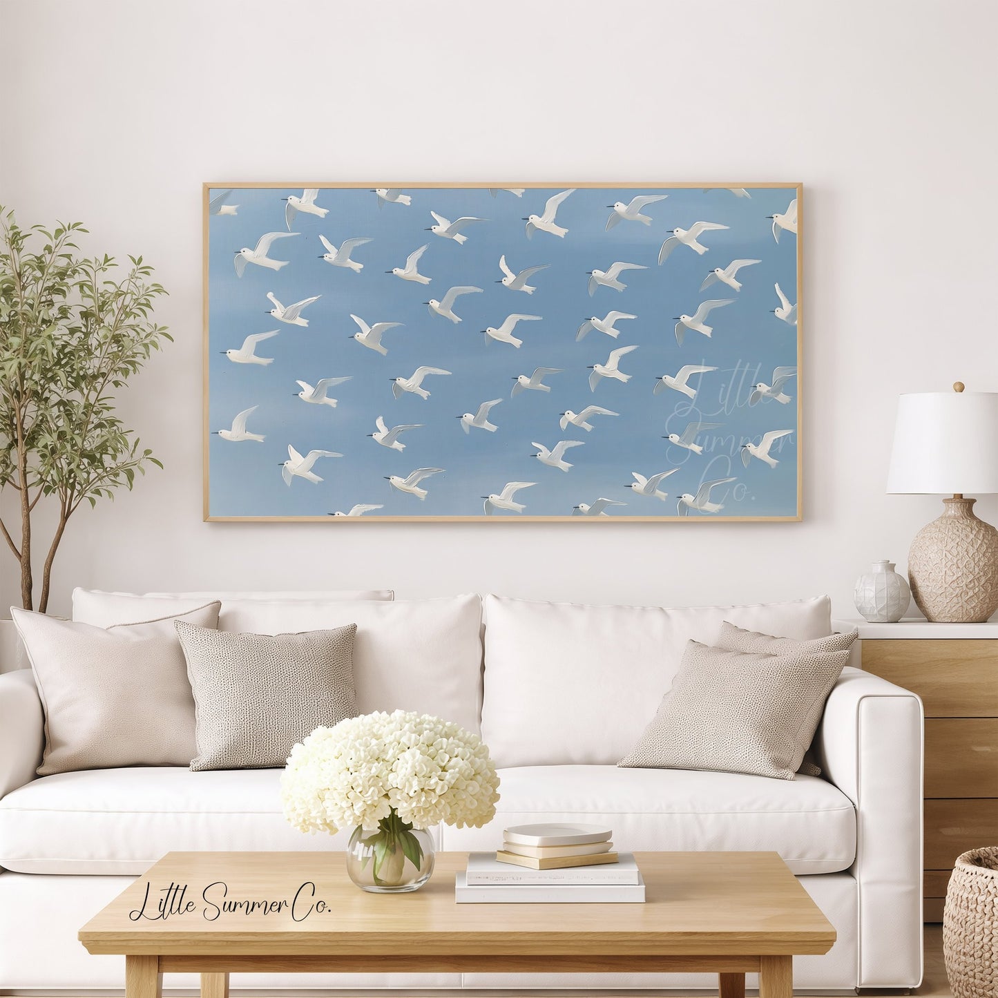 Flying White Birds Frame TV Art displayed on a TV