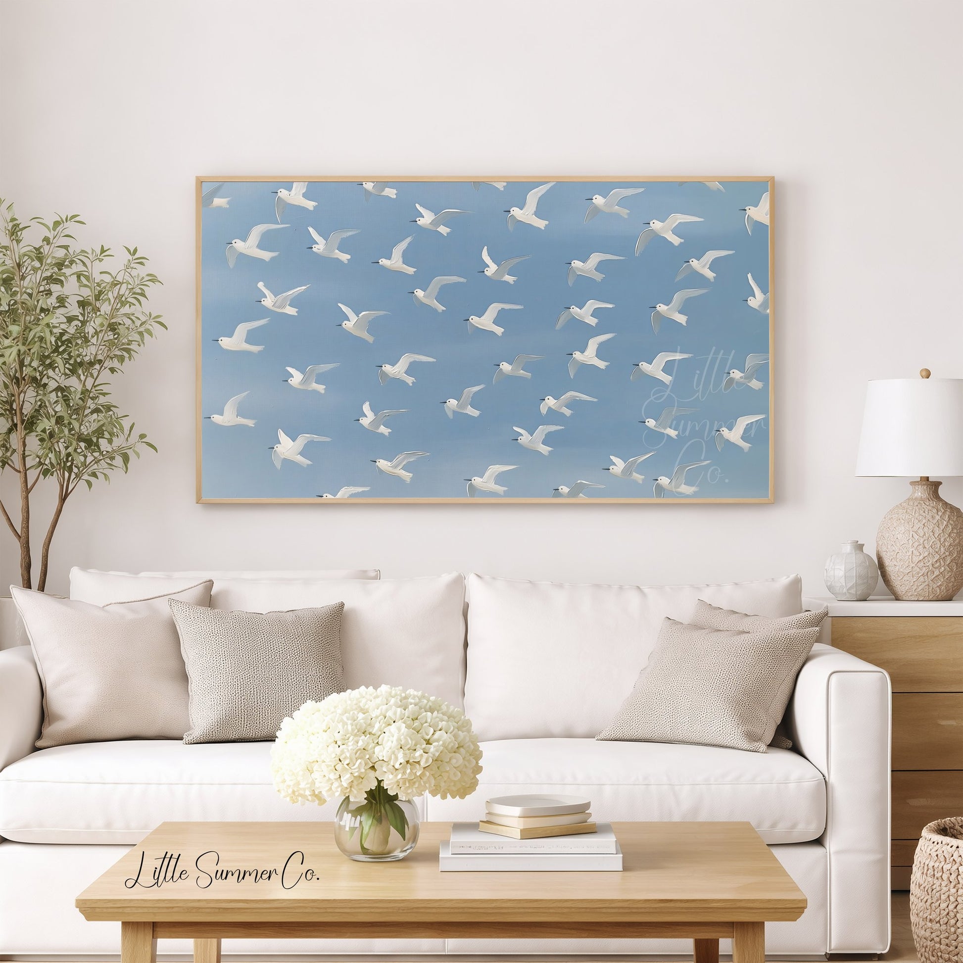 Flying White Birds Frame TV Art displayed on a TV