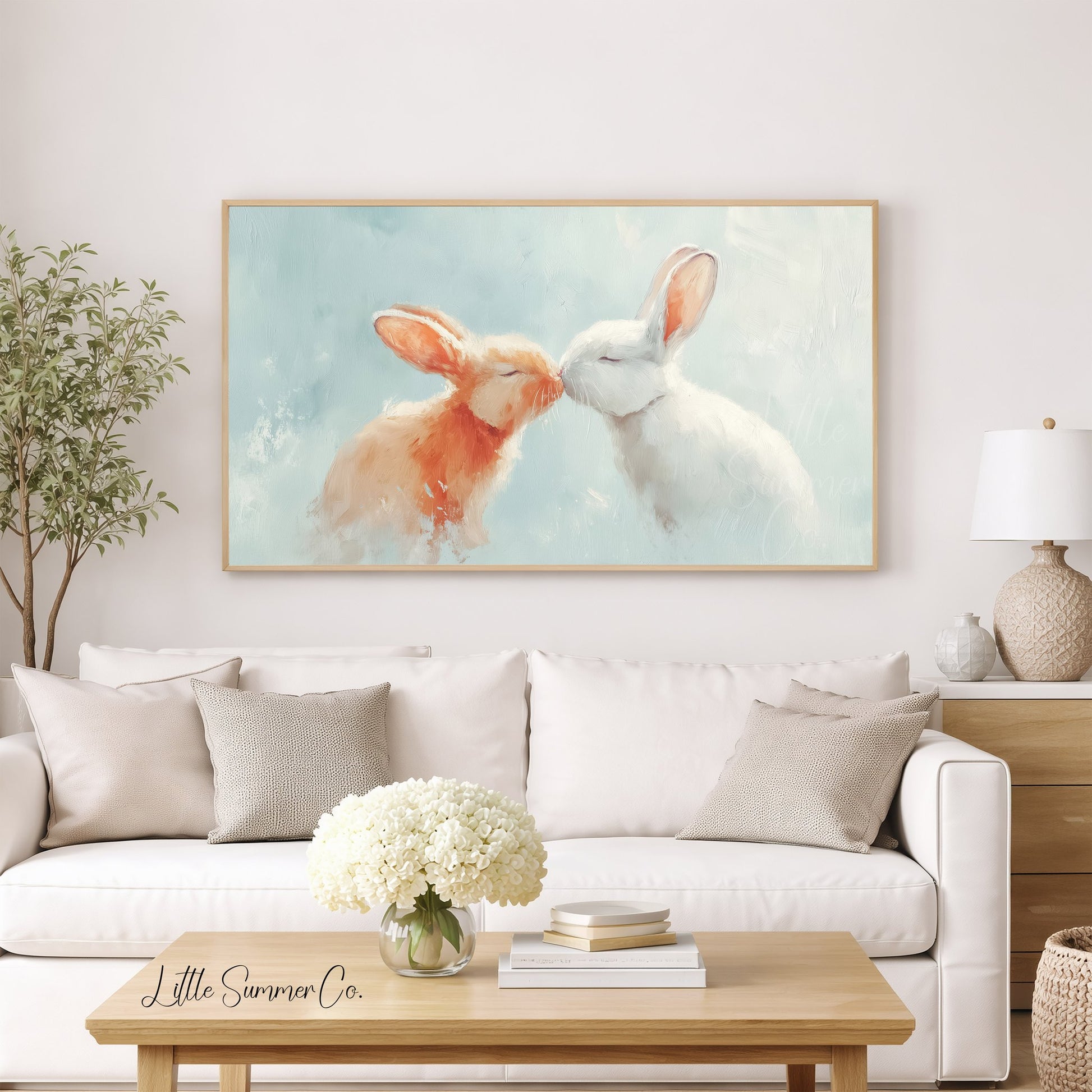 Kissing Bunnies Frame TV Art displayed on a TV