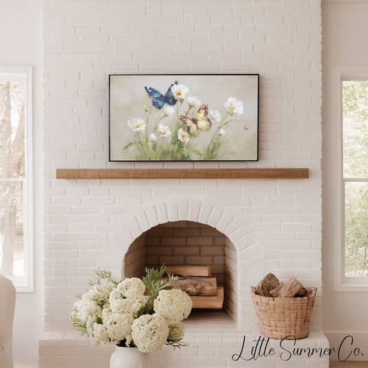 Butterflies White Flowers Frame TV Art displayed on a TV