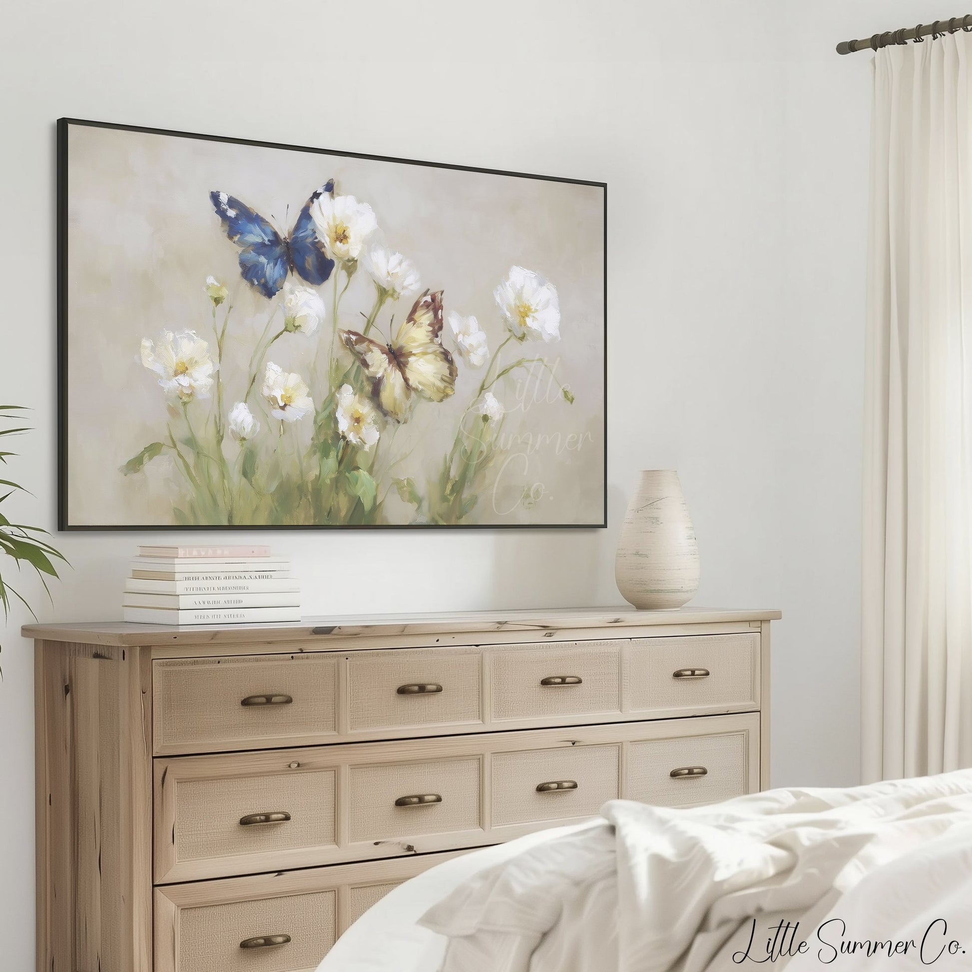 Butterflies White Flowers Frame TV Art displayed on a TV