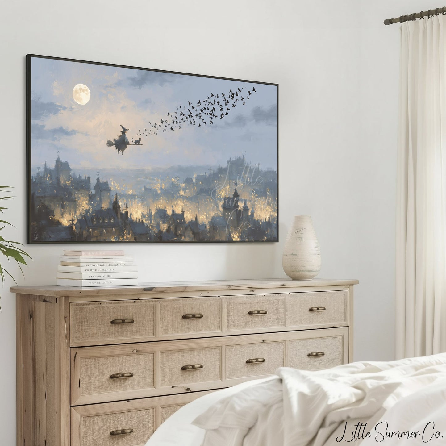 Witch Flying Over Town Frame TV Art displayed on a TV
