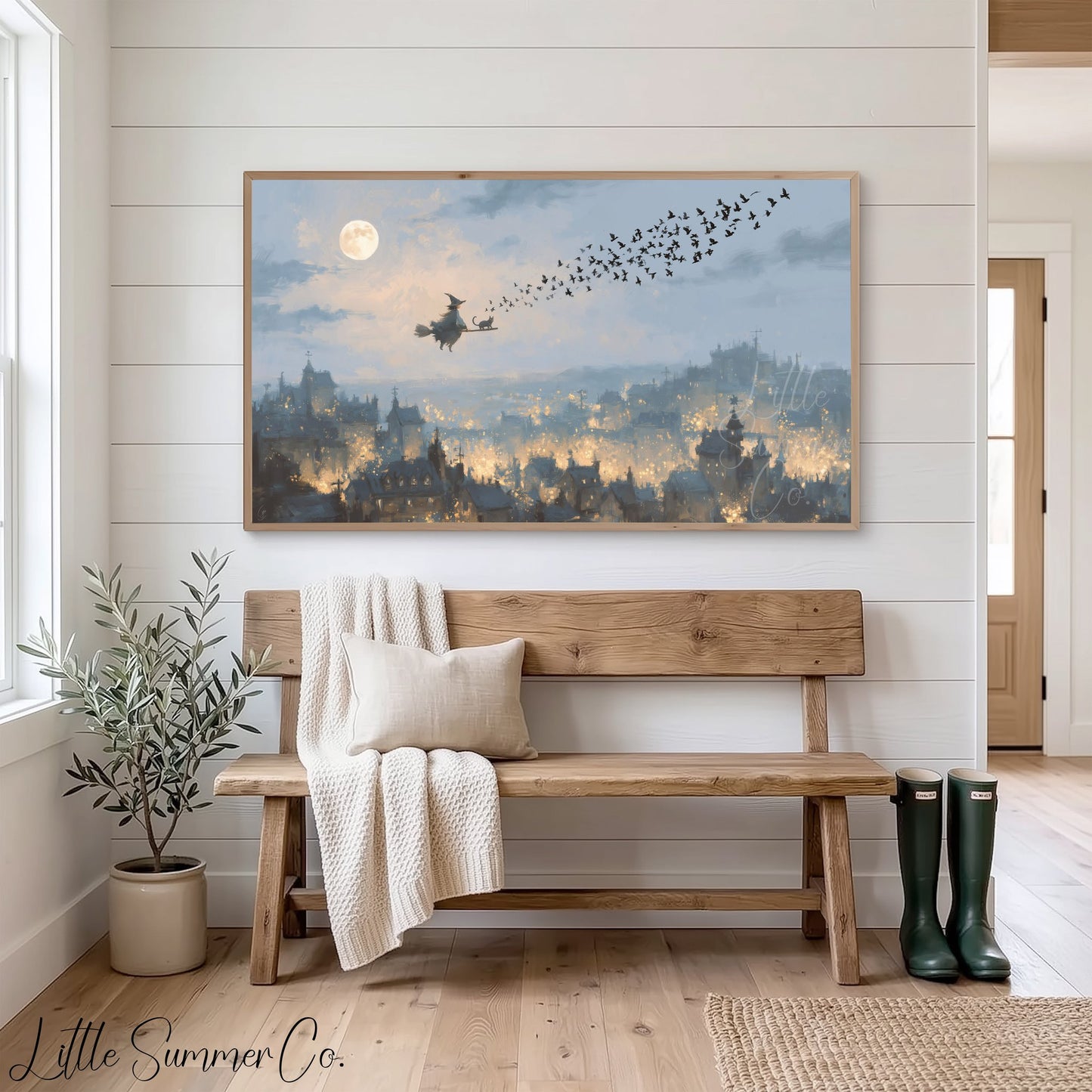 Witch Flying Over Town Frame TV Art displayed on a TV