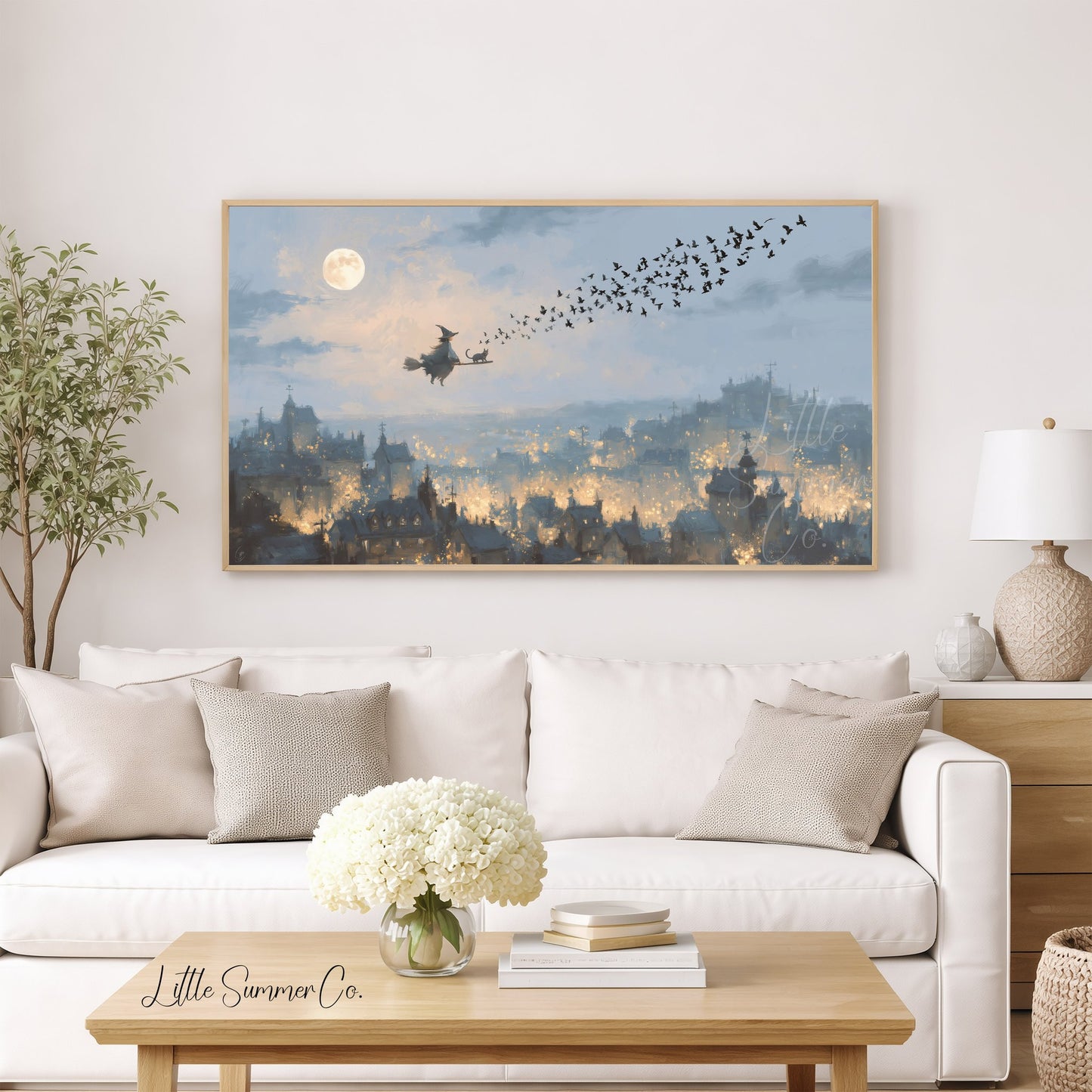 Witch Flying Over Town Frame TV Art displayed on a TV