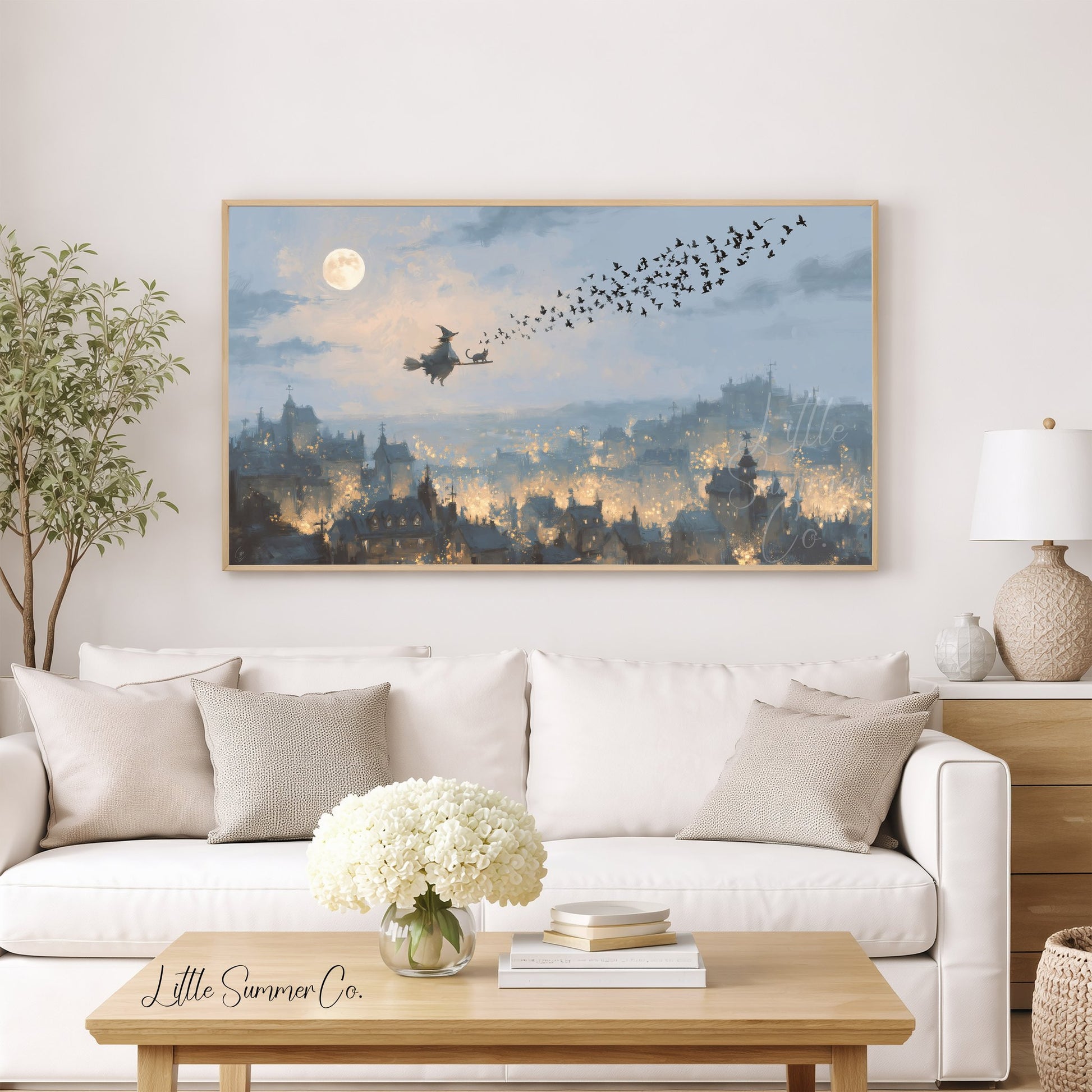 Witch Flying Over Town Frame TV Art displayed on a TV