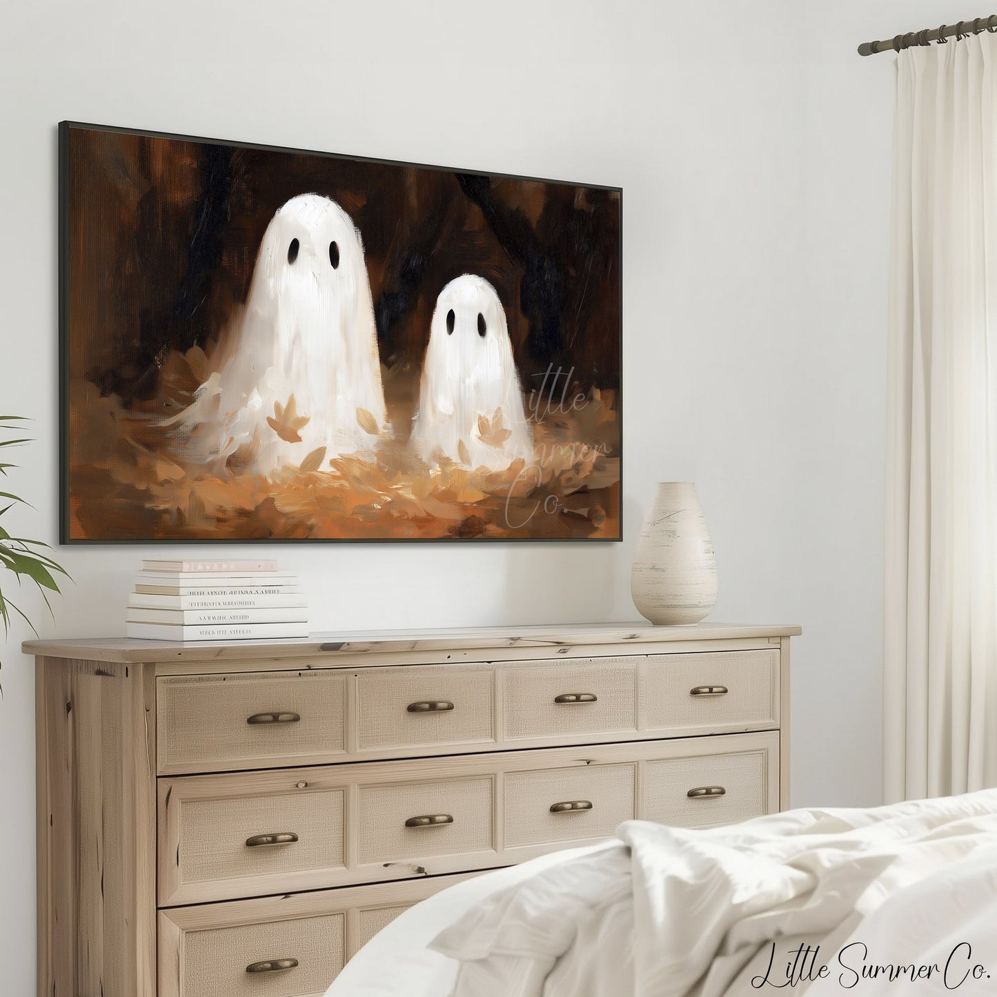 Ghost Pair Autumn Leaves Frame TV Art displayed on a TV
