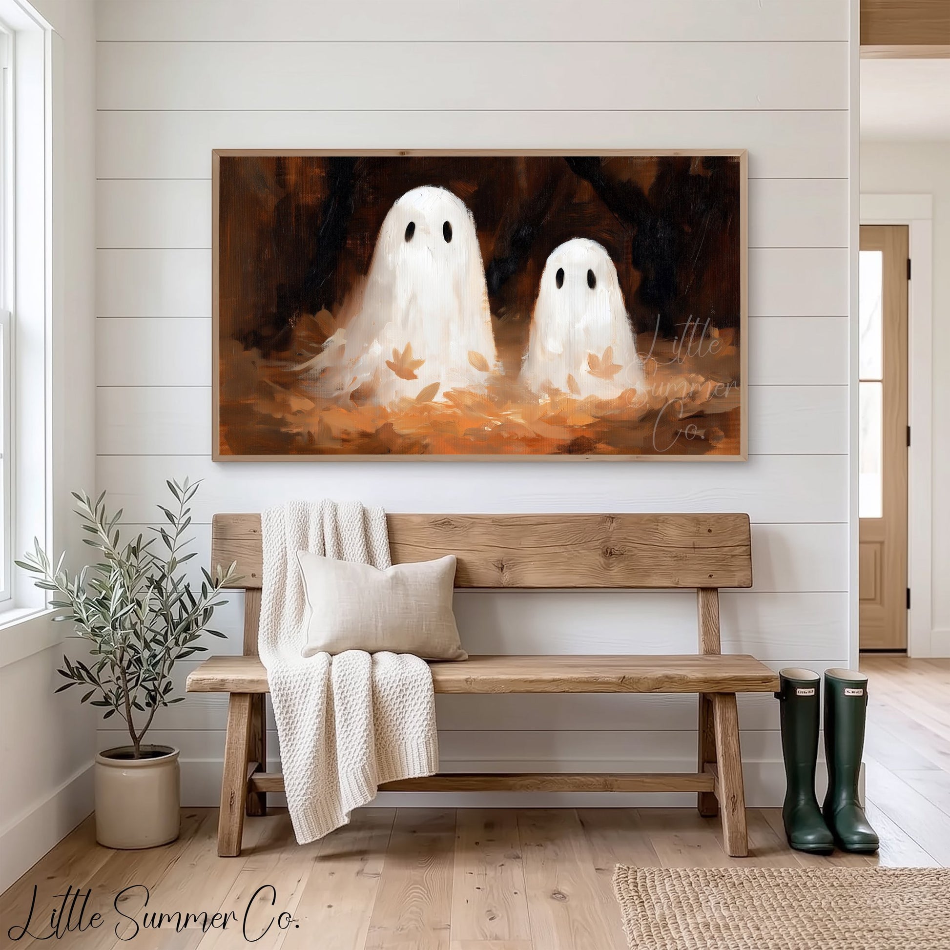 Ghost Pair Autumn Leaves Frame TV Art displayed on a TV