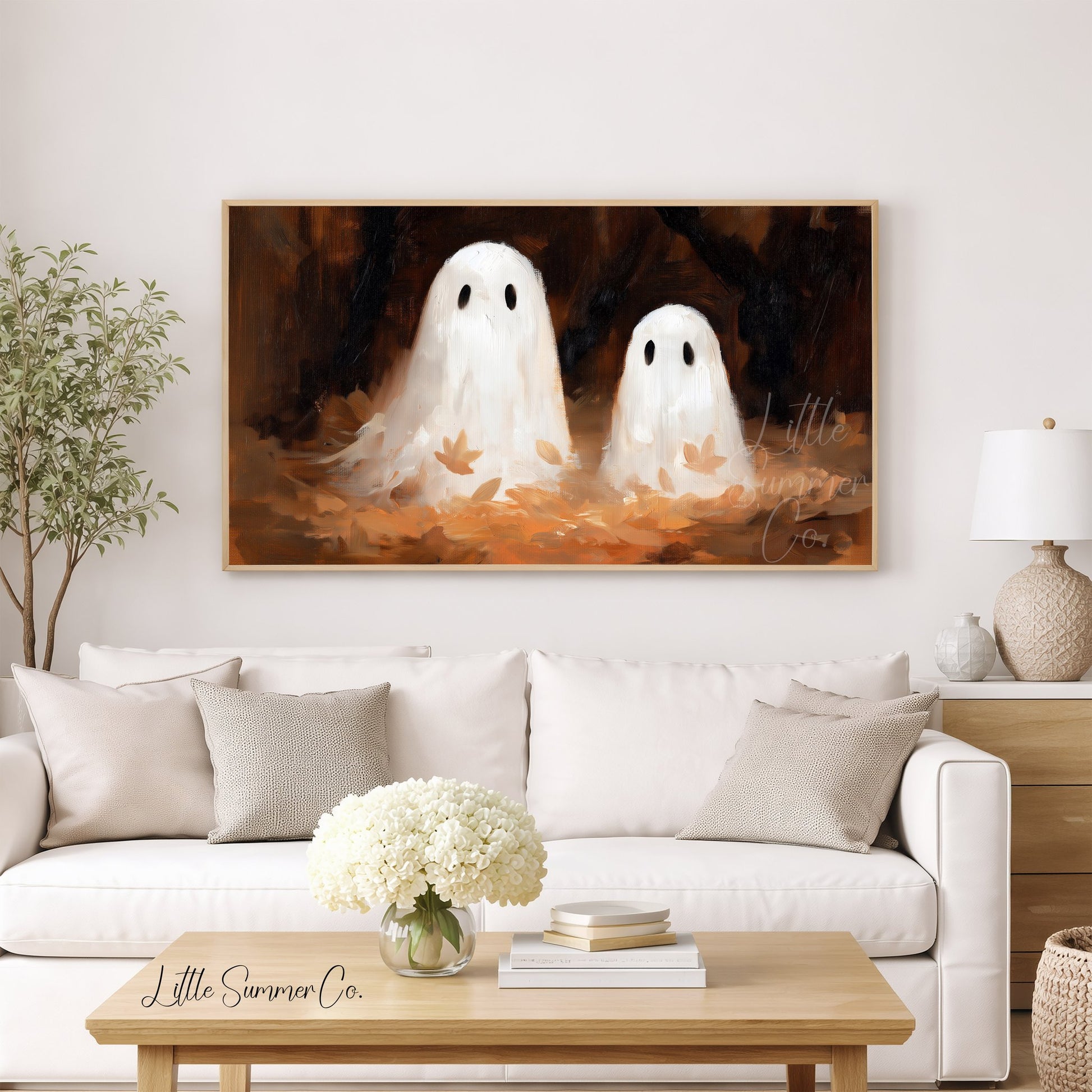 Ghost Pair Autumn Leaves Frame TV Art displayed on a TV