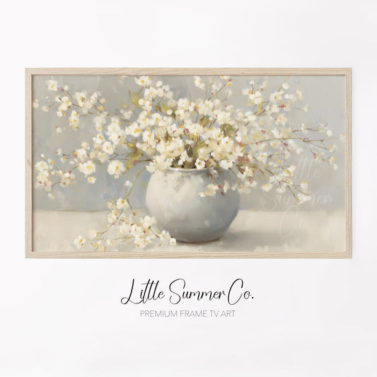 White Cherry Blossoms In Round Vase Frame TV Art displayed on a TV