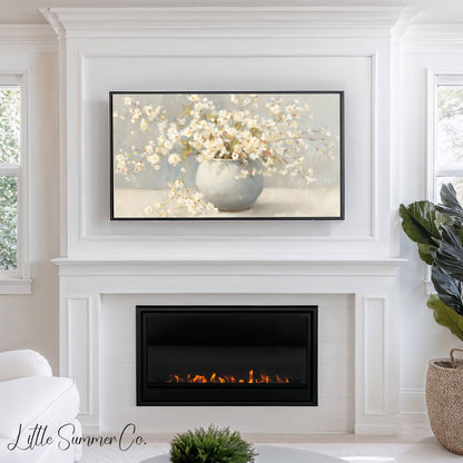 White Cherry Blossoms In Round Vase Frame TV Art displayed on a TV