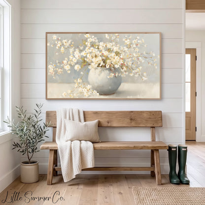 White Cherry Blossoms In Round Vase Frame TV Art displayed on a TV