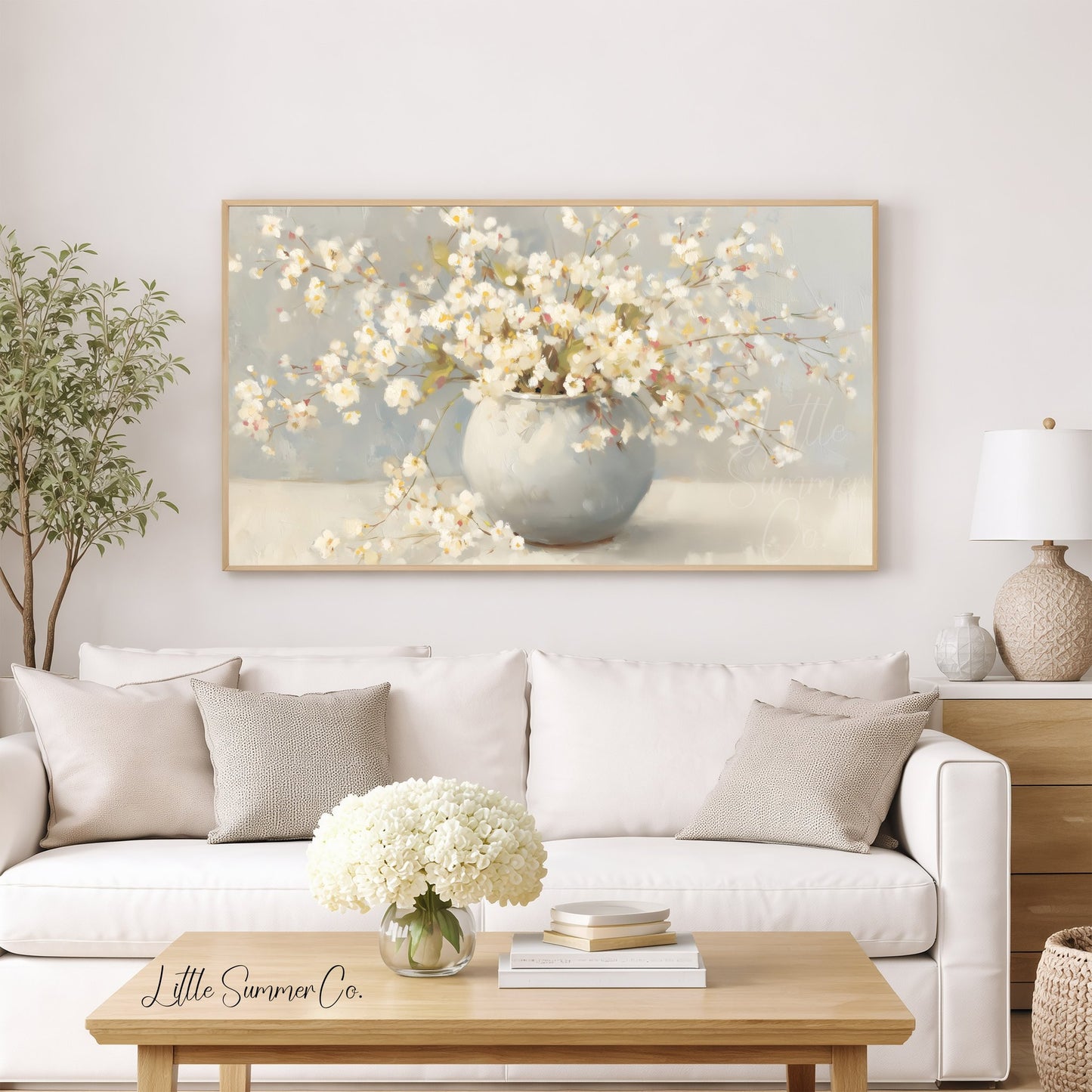 White Cherry Blossoms In Round Vase Frame TV Art displayed on a TV