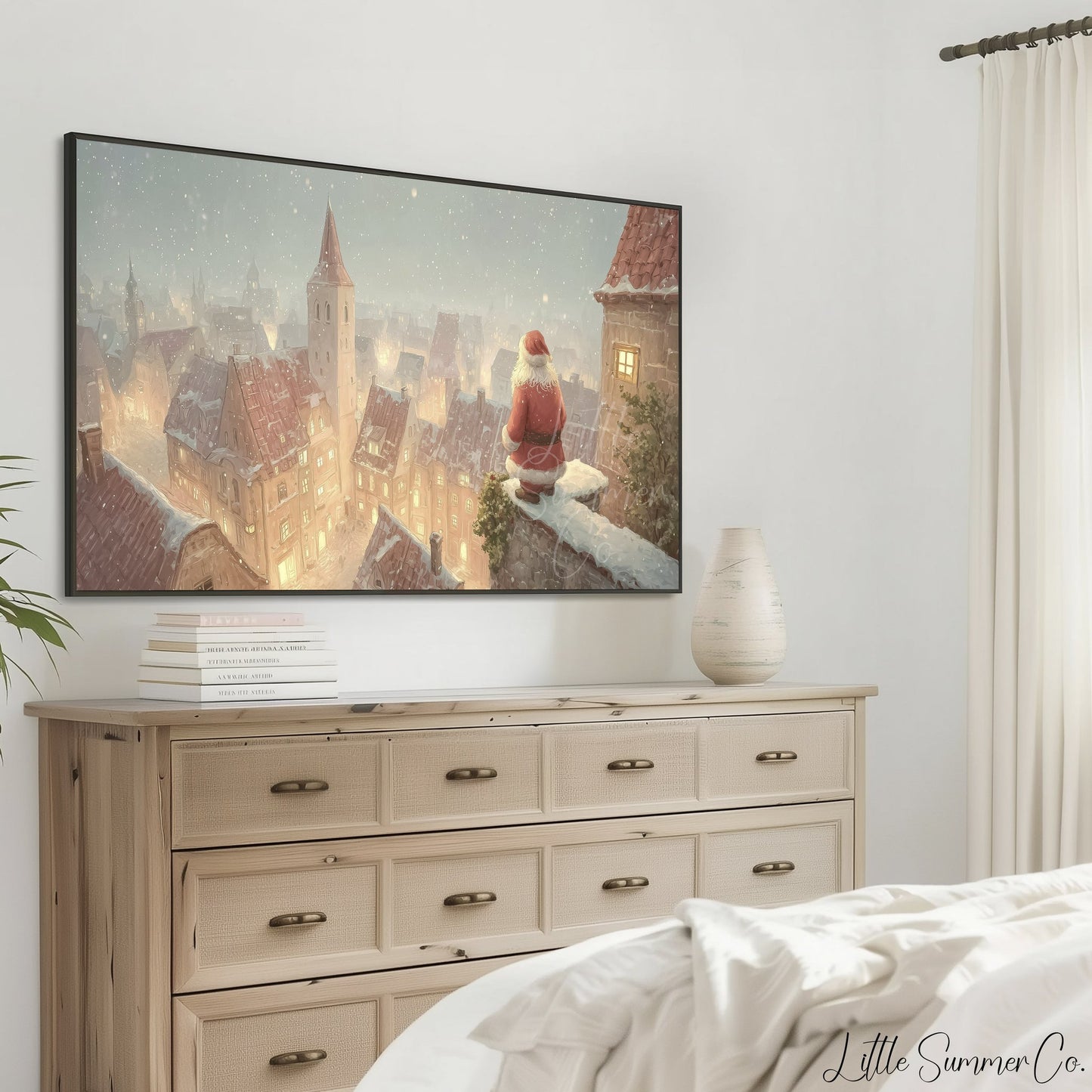 Santa Over Snowy Town Frame TV Art displayed on a TV