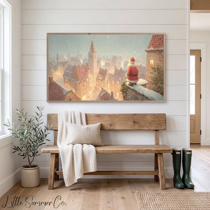 Santa Over Snowy Town Frame TV Art displayed on a TV