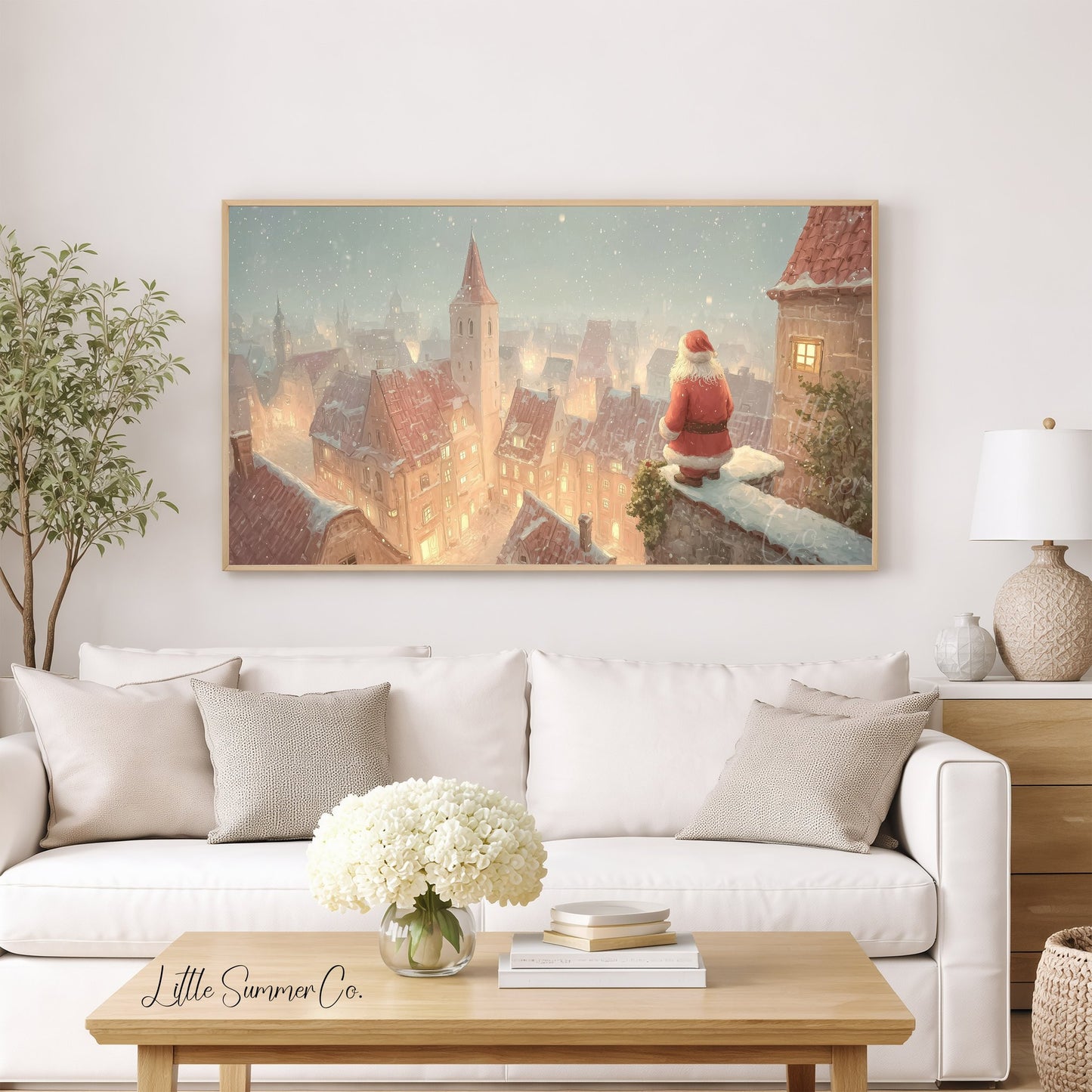 Santa Over Snowy Town Frame TV Art displayed on a TV