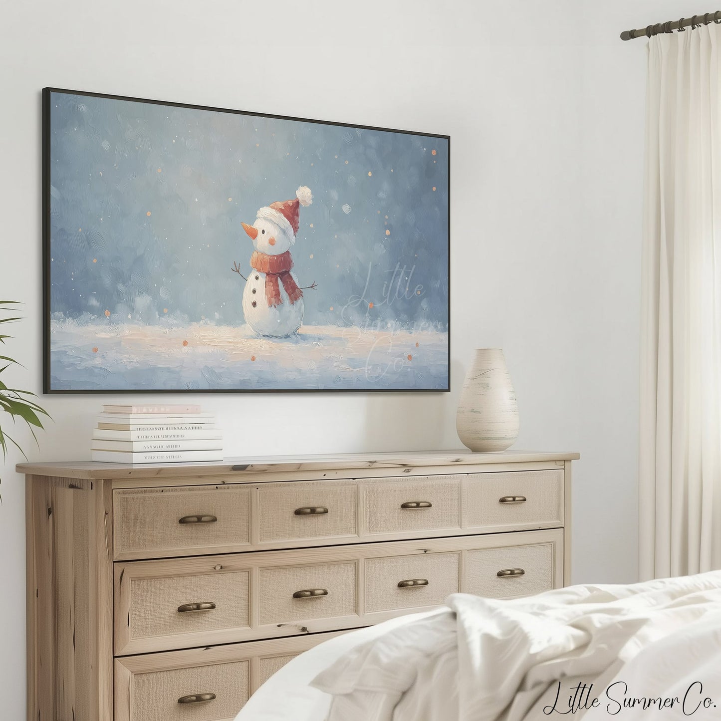 Snowman in the Snow Frame TV Art displayed on a TV