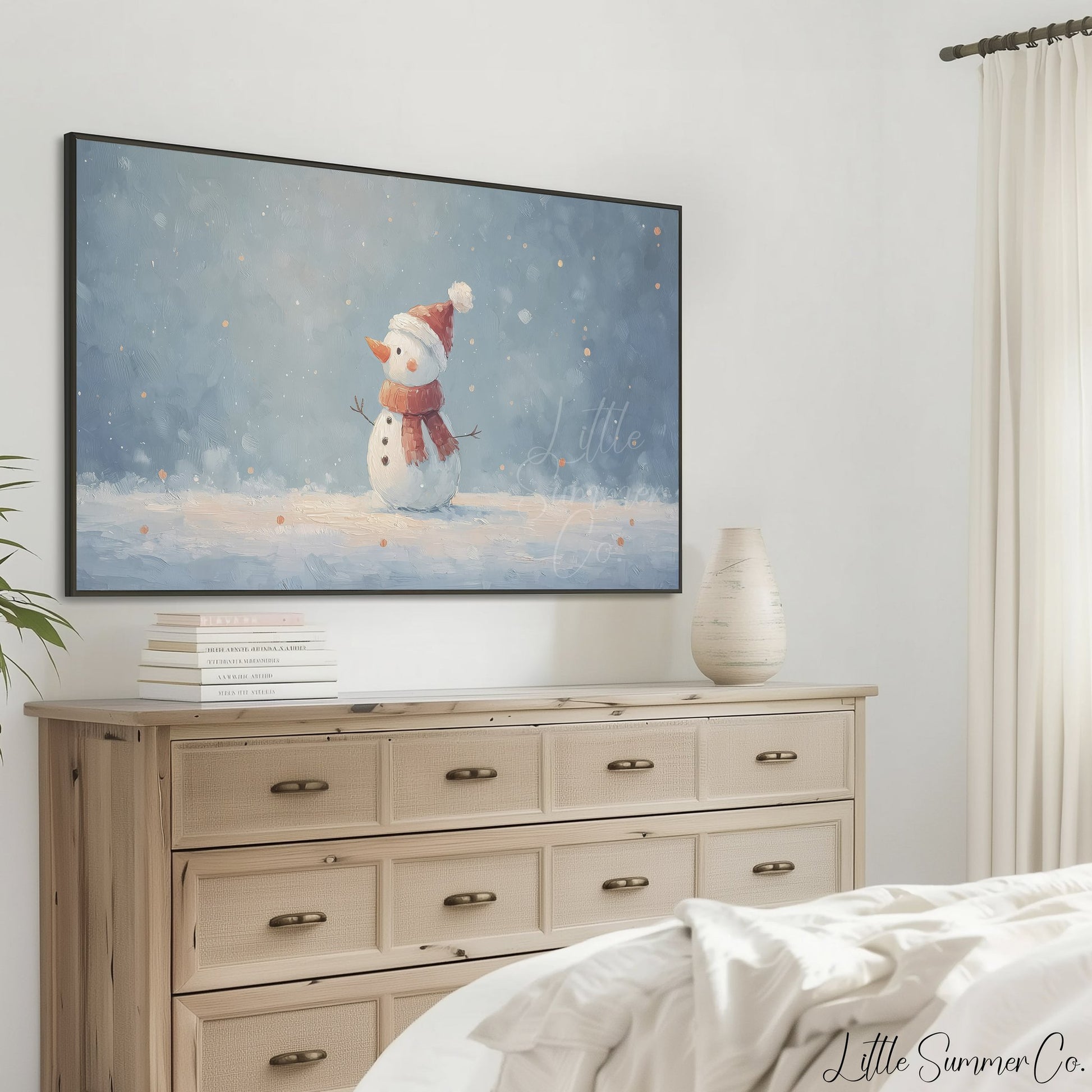 Snowman in the Snow Frame TV Art displayed on a TV