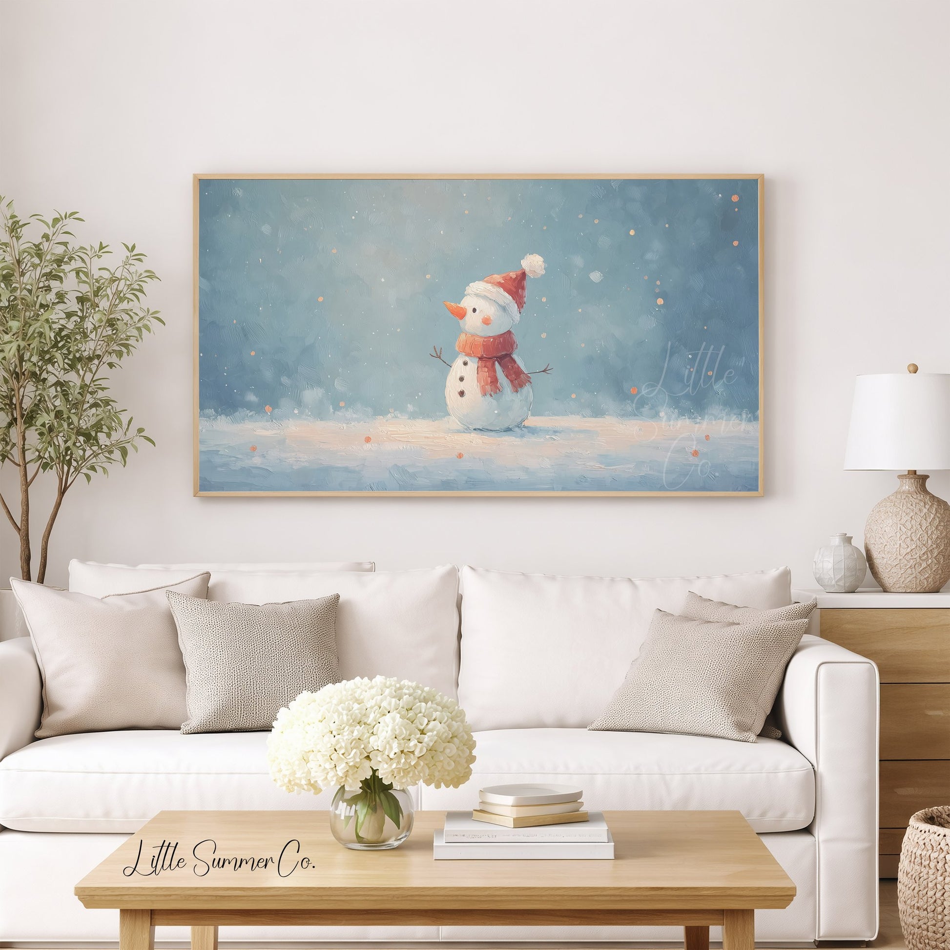 Snowman in the Snow Frame TV Art displayed on a TV