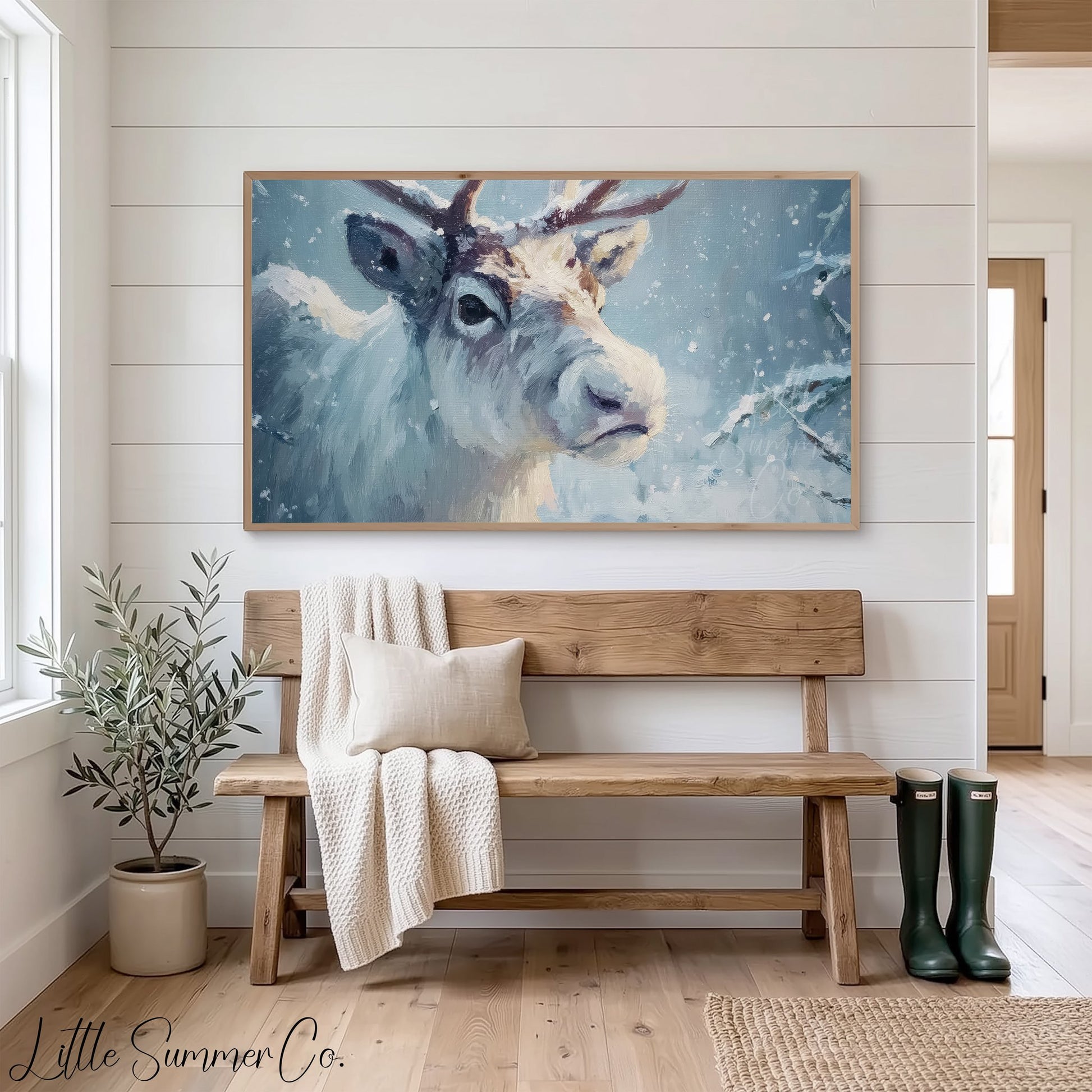 Reindeer in Snowstorm Frame TV Art displayed on a TV