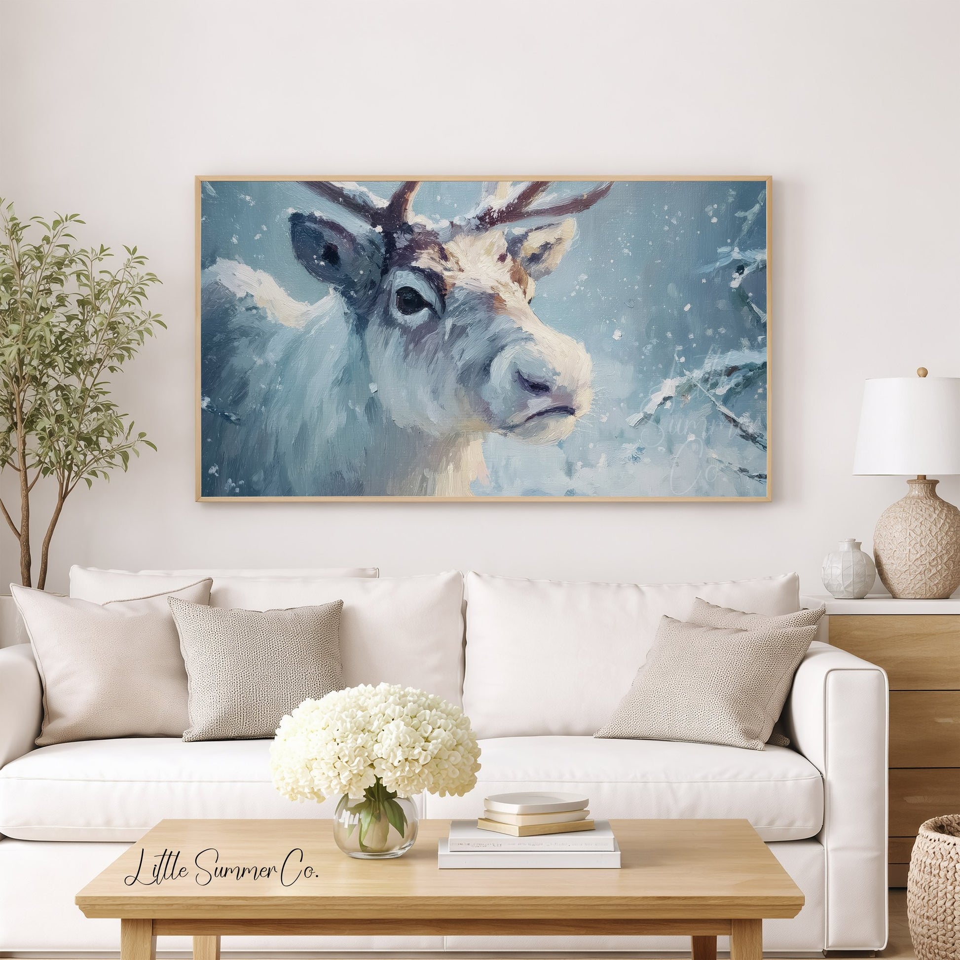 Reindeer in Snowstorm Frame TV Art displayed on a TV