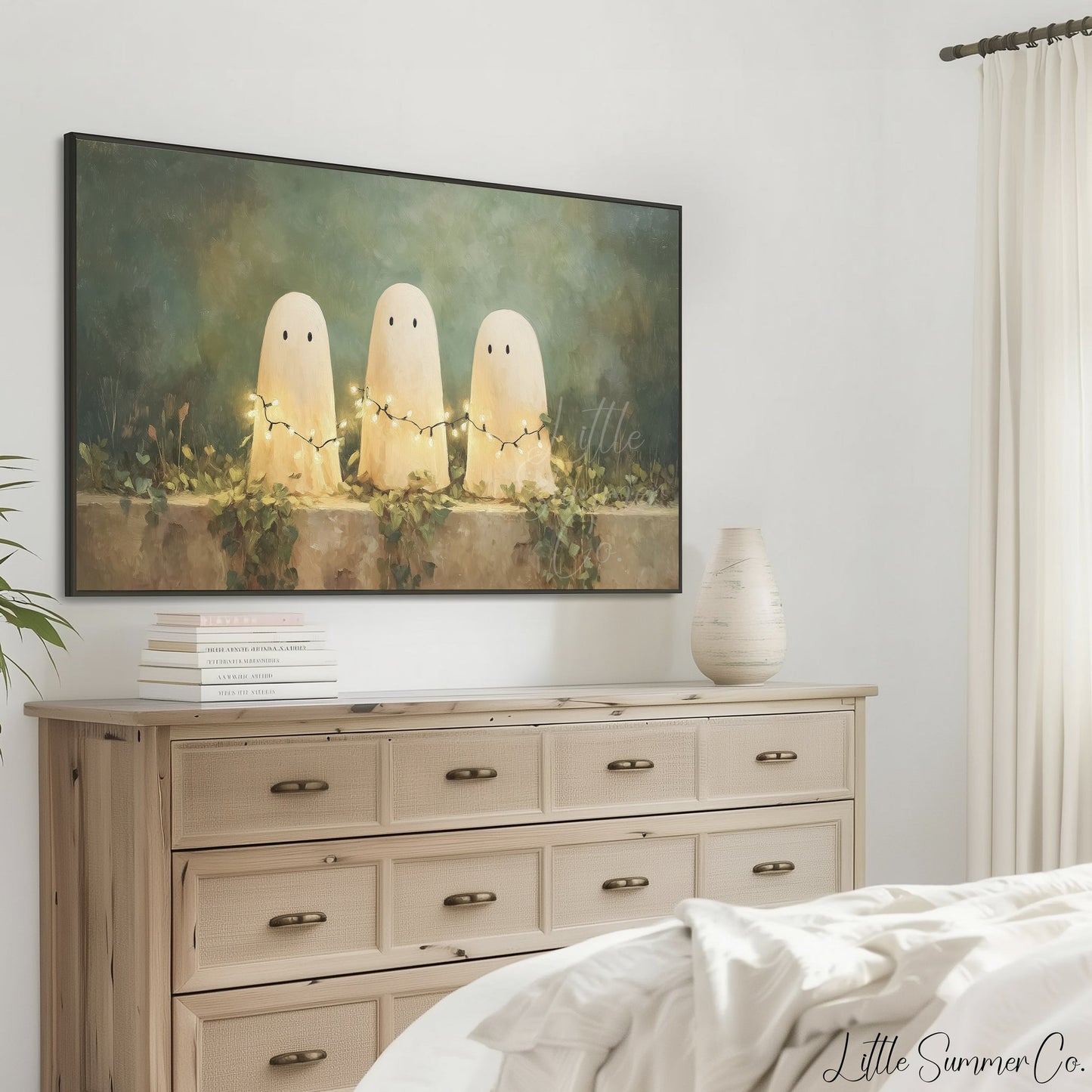 Ghosts with Fairy Lights Frame TV Art displayed on a TV