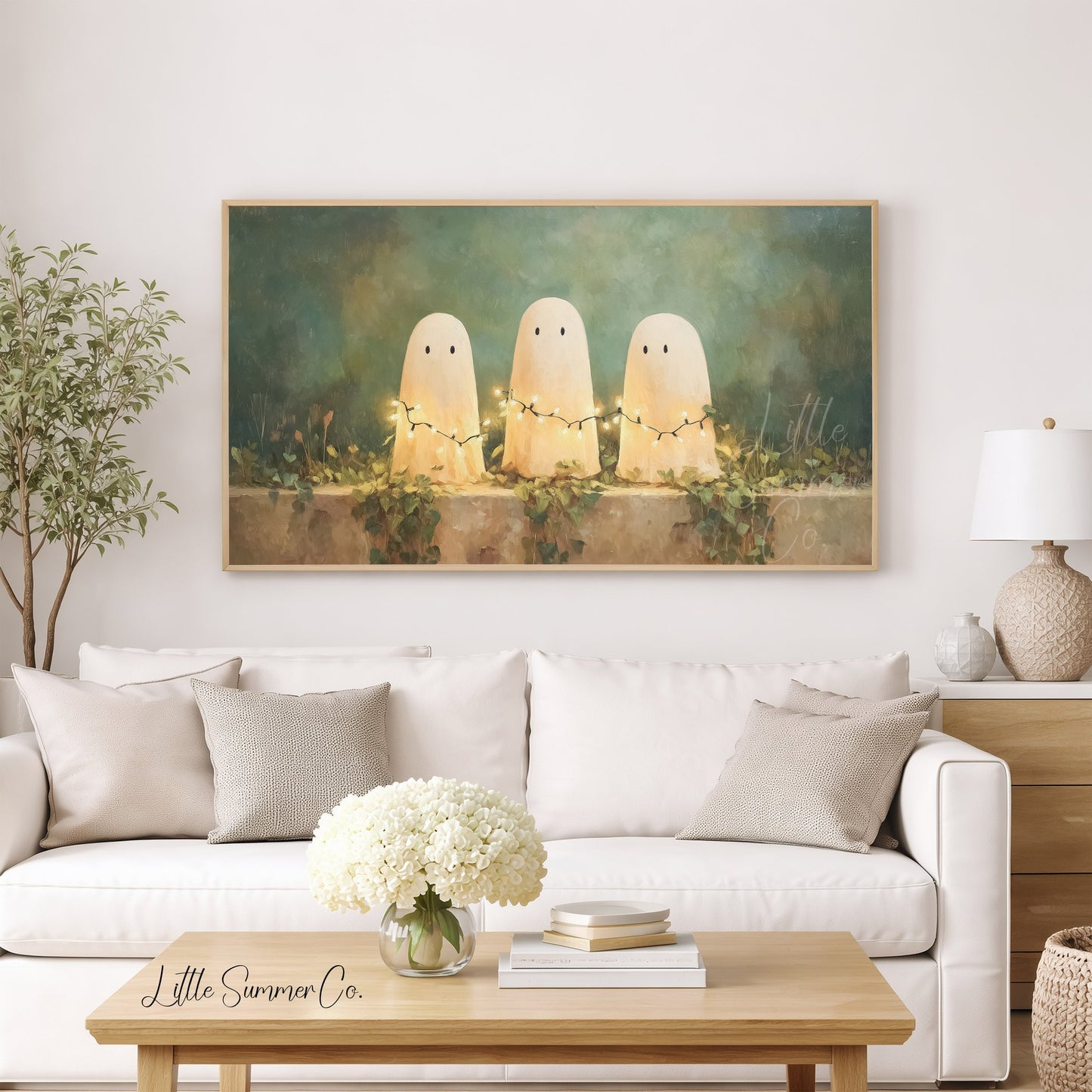 Ghosts with Fairy Lights Frame TV Art displayed on a TV