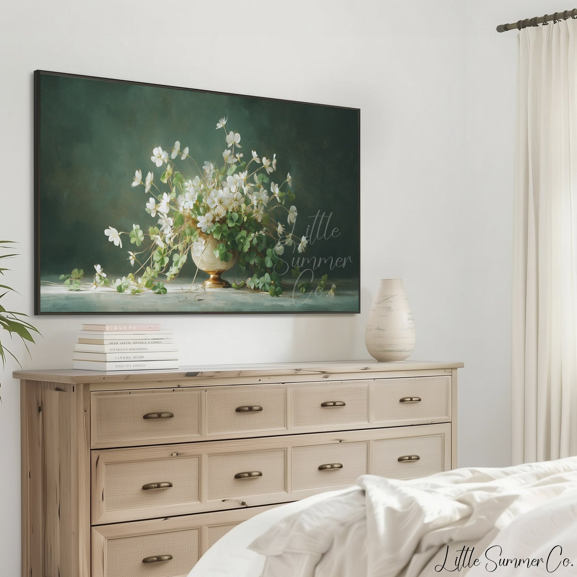 White Shamrock Flowers in Urn Frame TV Art displayed on a TV