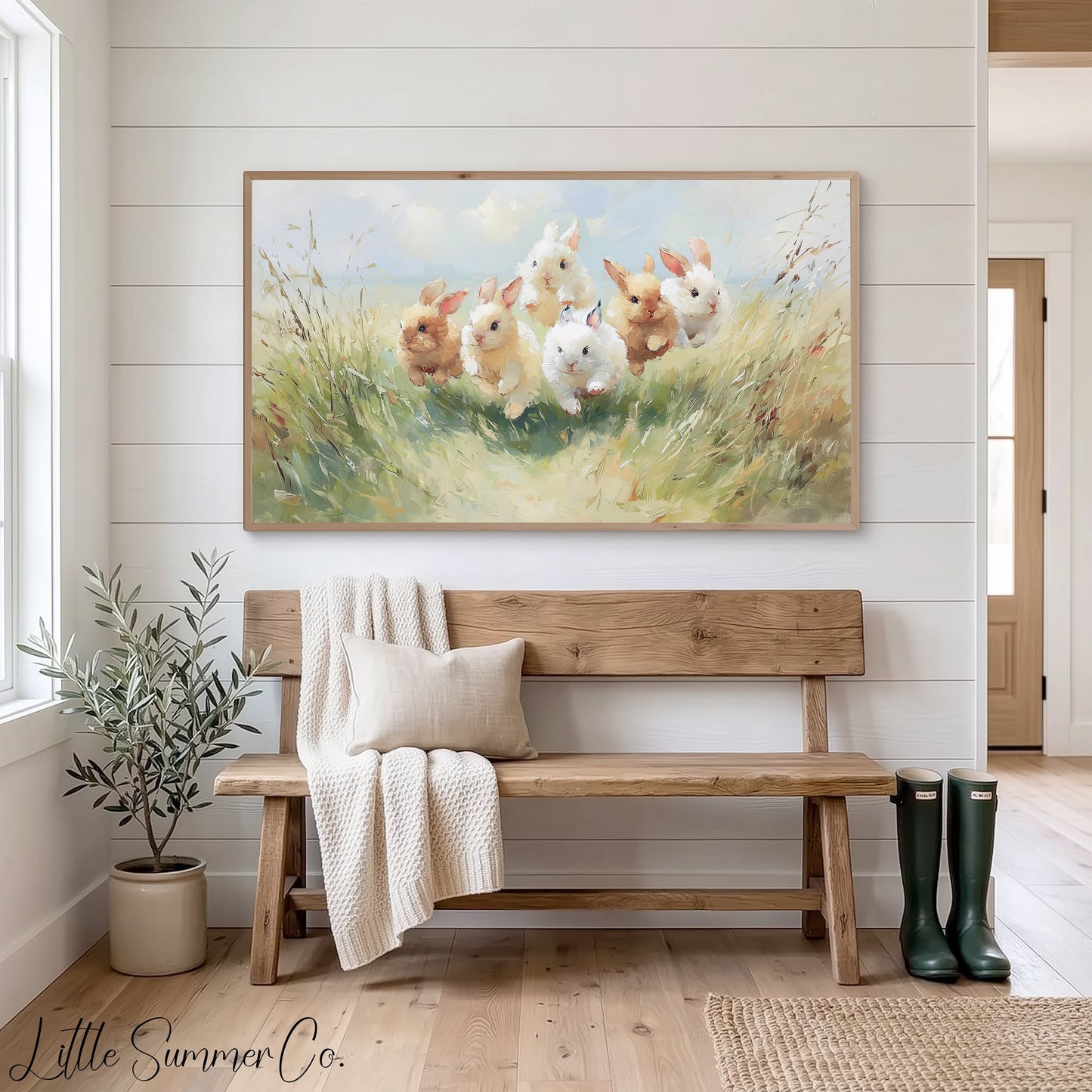 Baby Bunnies Running in Meadow Frame TV Art displayed on a TV