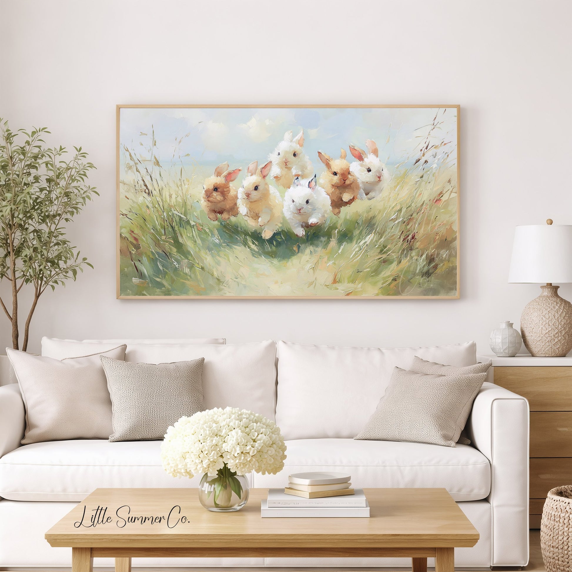 Baby Bunnies Running in Meadow Frame TV Art displayed on a TV