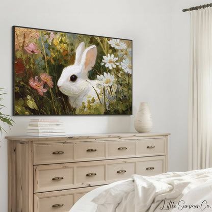 White Bunny in Wildflowers Frame TV Art displayed on a TV