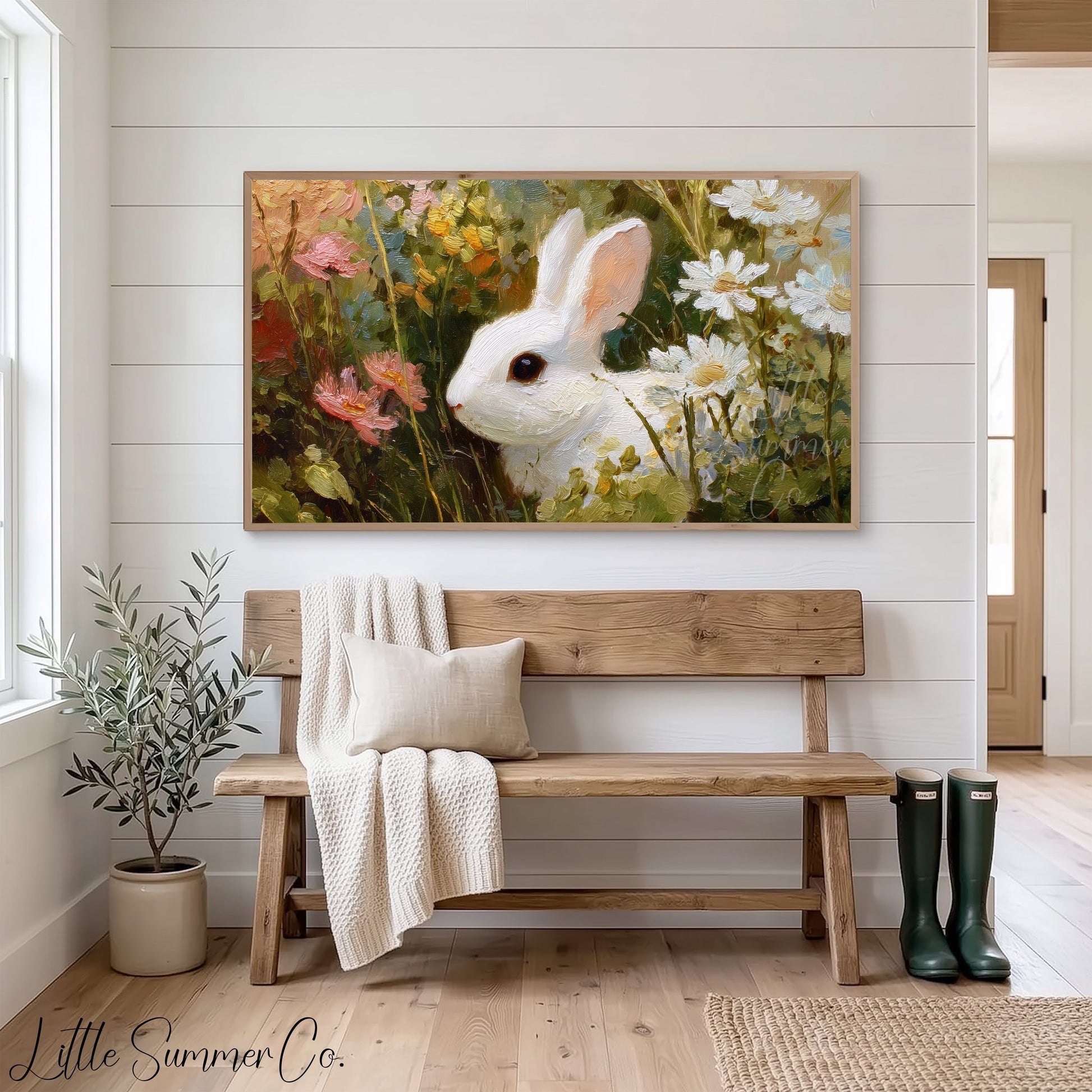 White Bunny in Wildflowers Frame TV Art displayed on a TV