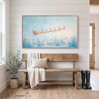 Santa's Sleigh over Snowy Village Frame TV Art displayed on a TV