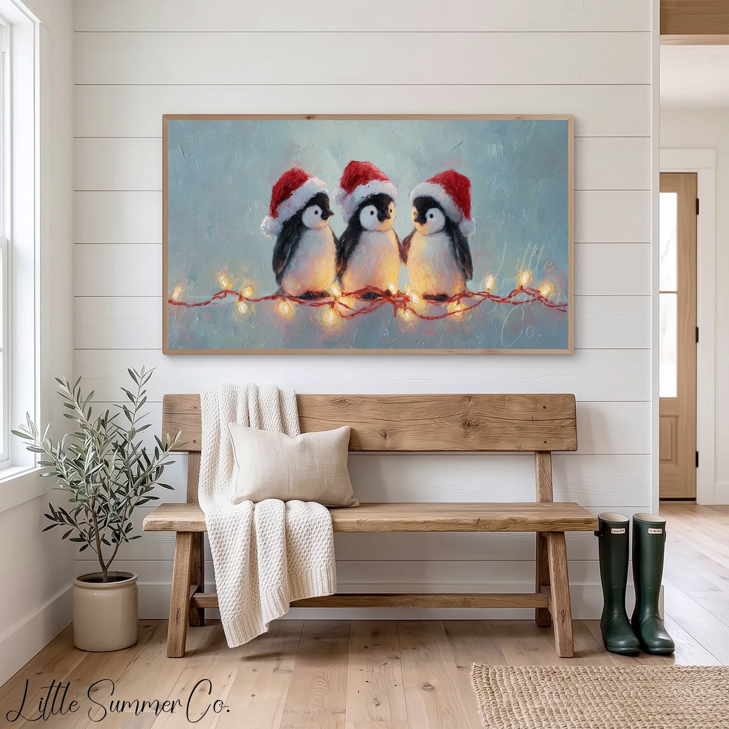 Penguins with Christmas Lights Frame TV Art displayed on a TV