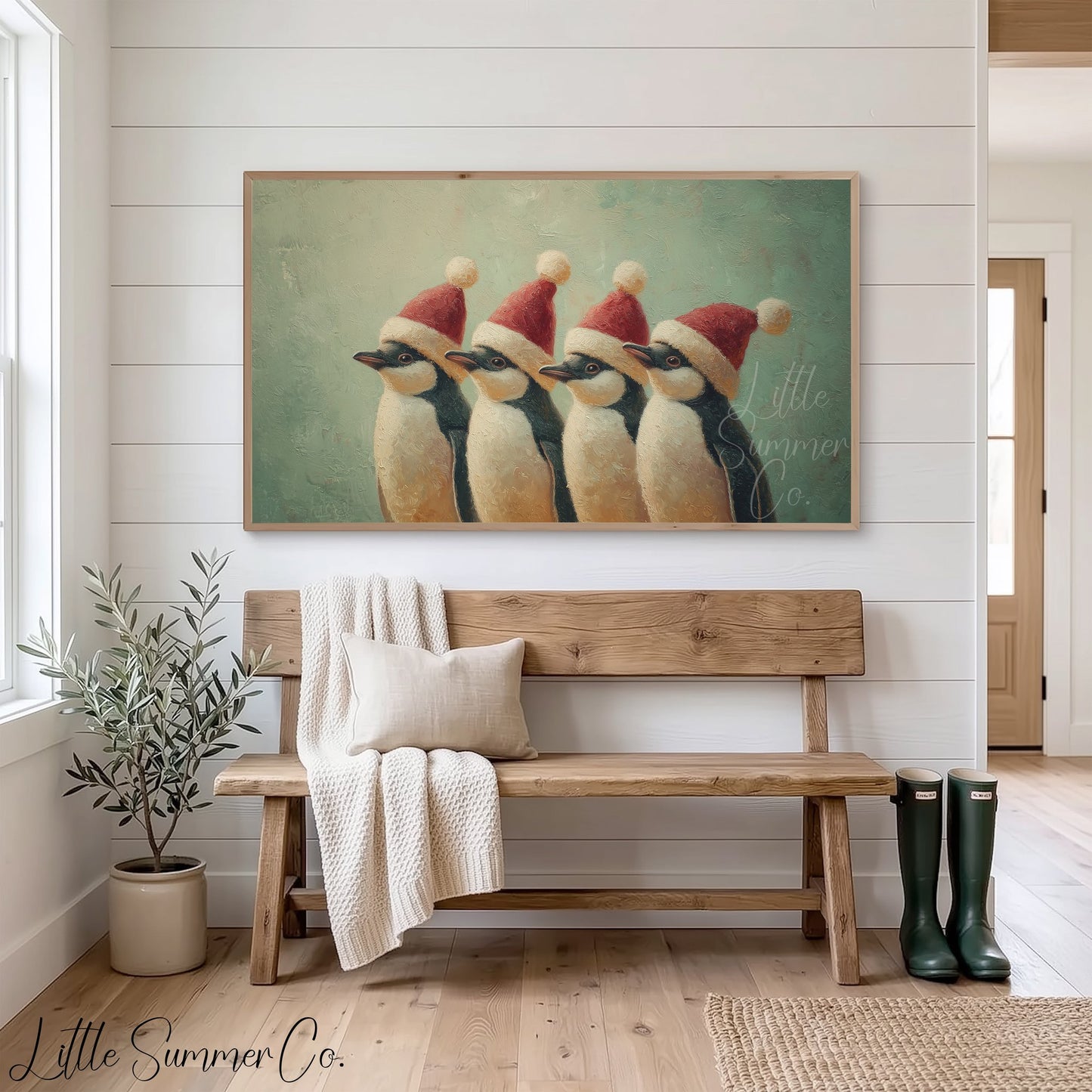 Penguins Wearing Santa Hats Frame TV Art displayed on a TV