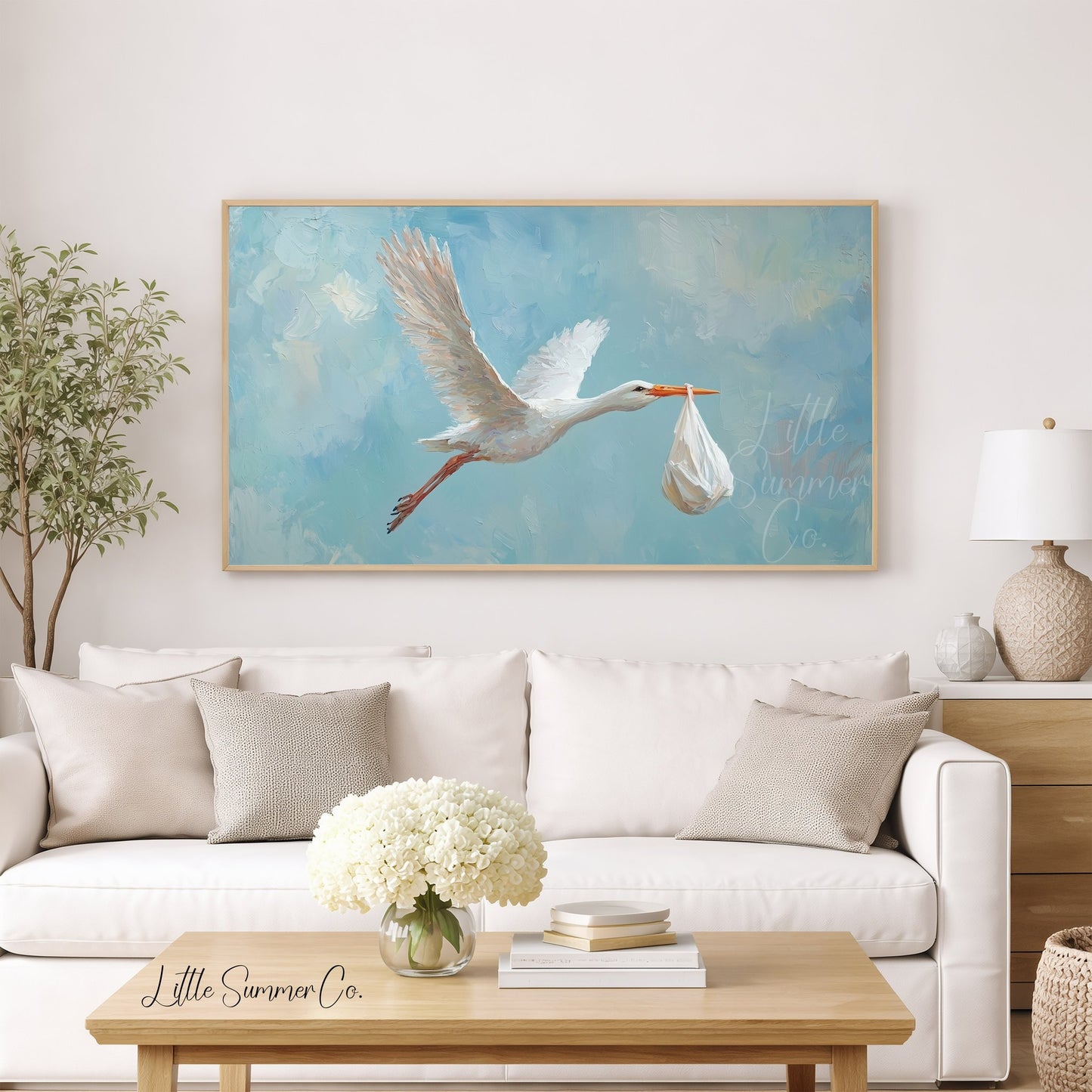 Stork Carrying Baby Frame TV Art displayed on a TV