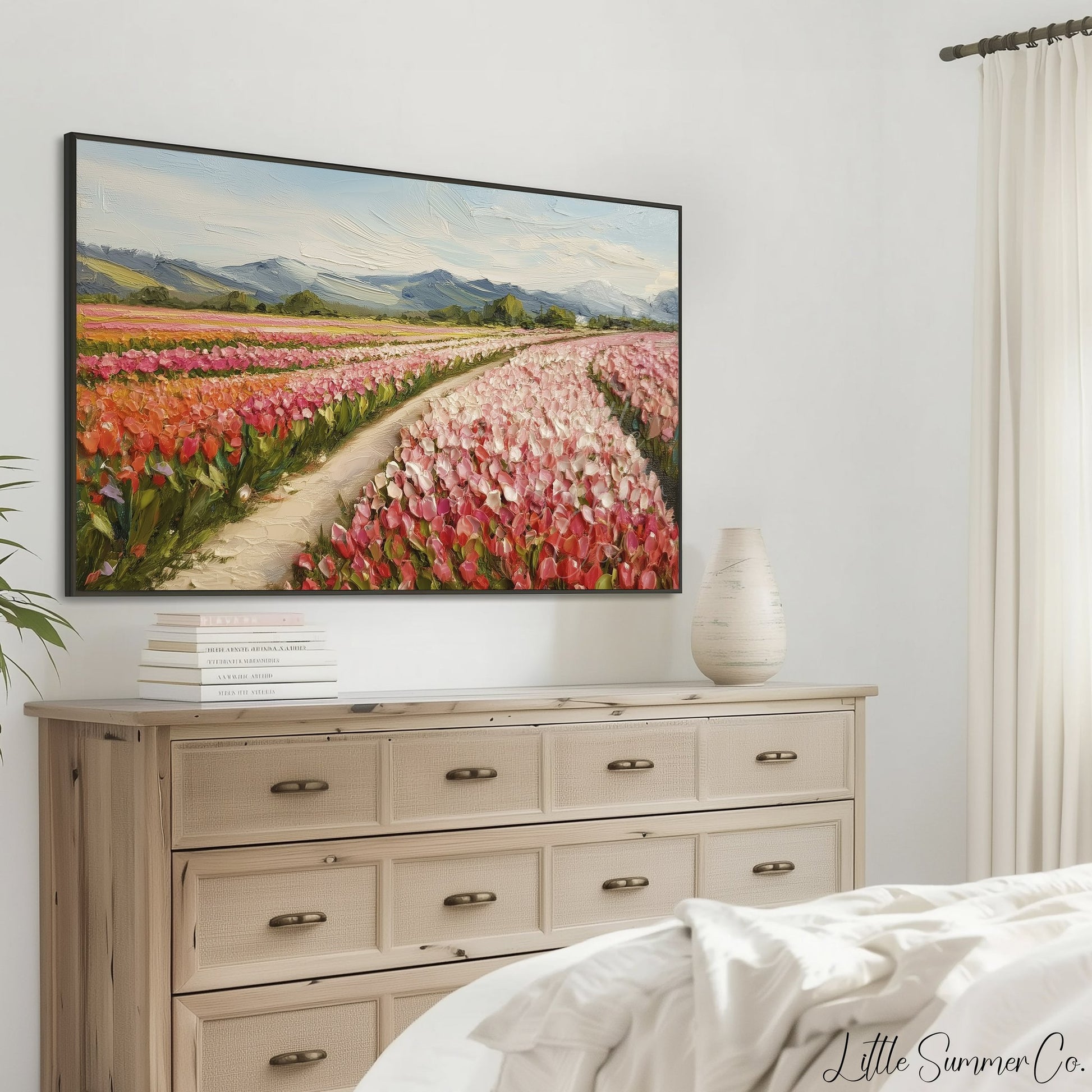 Colourful Tulip Field with Mountains Frame TV Art displayed on a TV