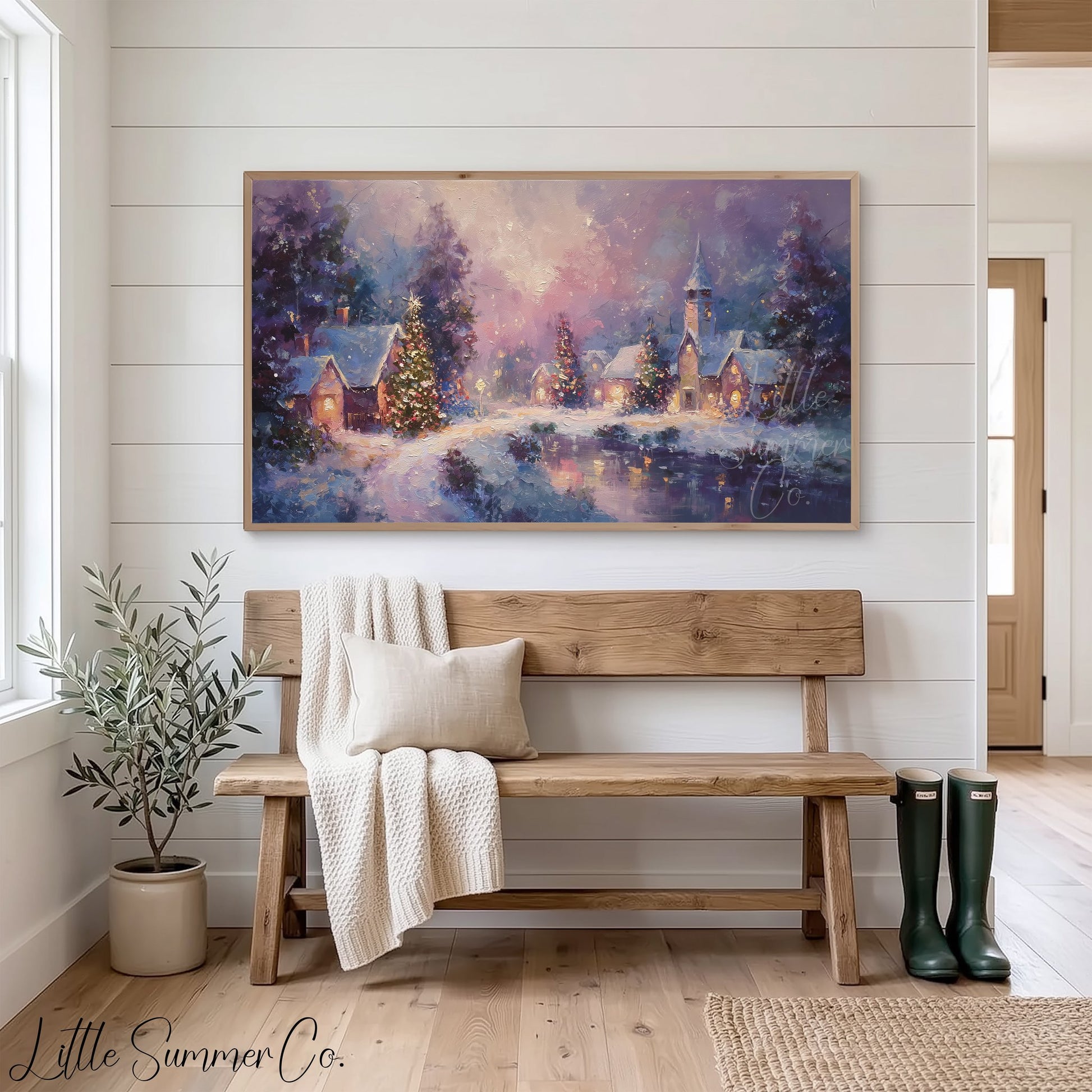 Snowy Christmas Village at Night Frame TV Art displayed on a TV