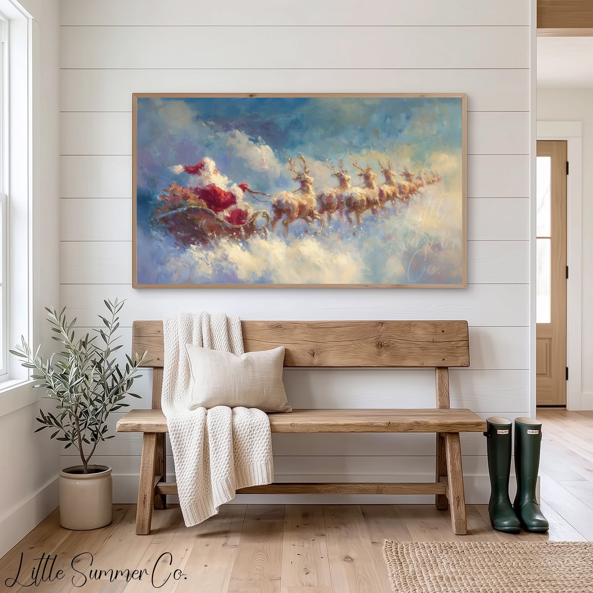 Santa's Sleigh Through the Clouds Frame TV Art displayed on a TV
