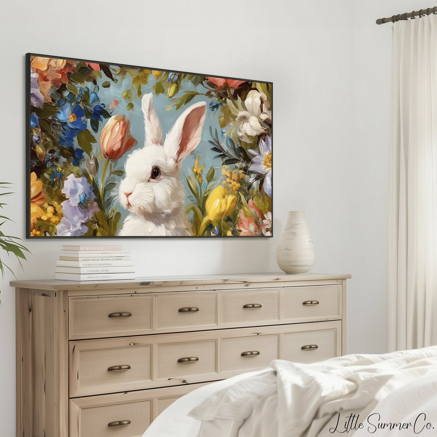 White Bunny Among Spring Flowers Frame TV Art displayed on a TV