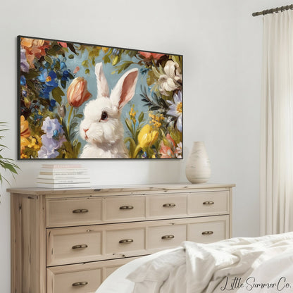 White Bunny Among Spring Flowers Frame TV Art displayed on a TV